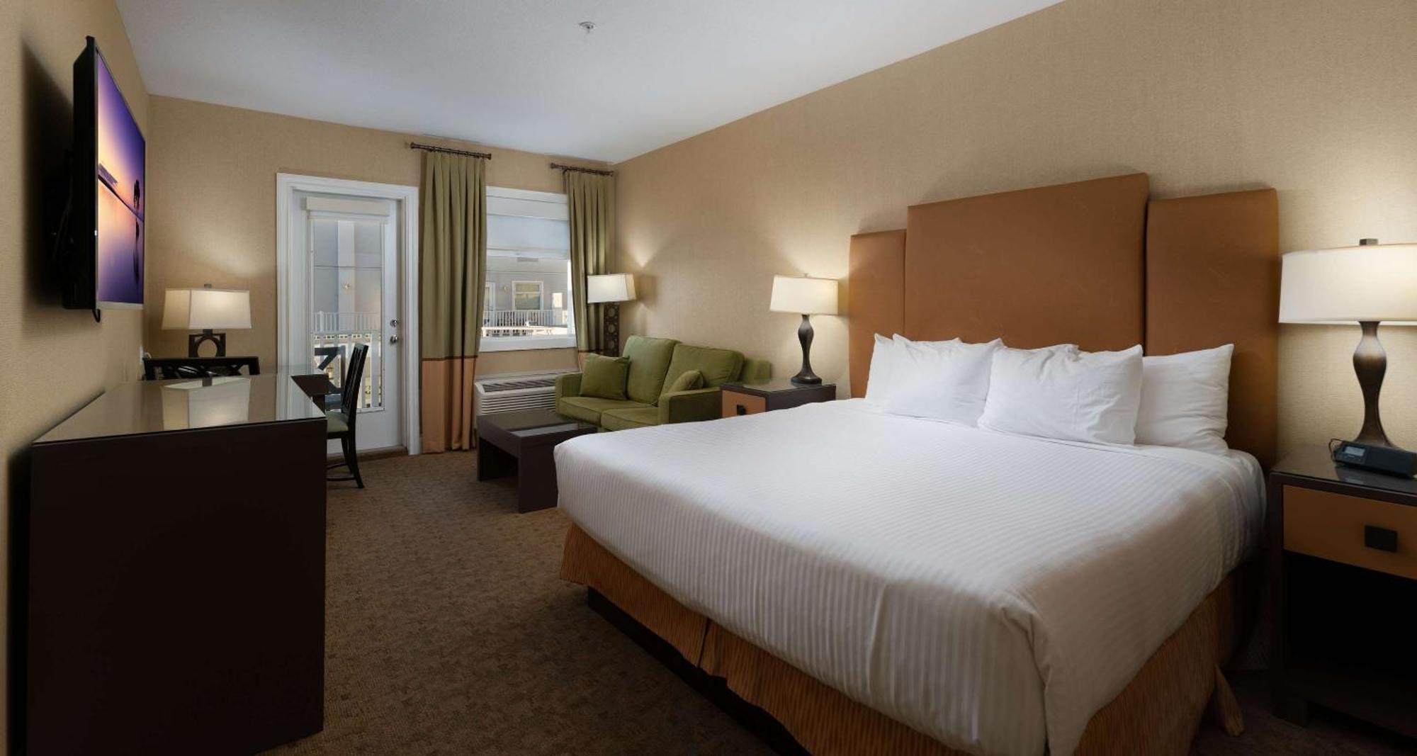 King Room with Sofa Bed, Balcony and Partial Water View