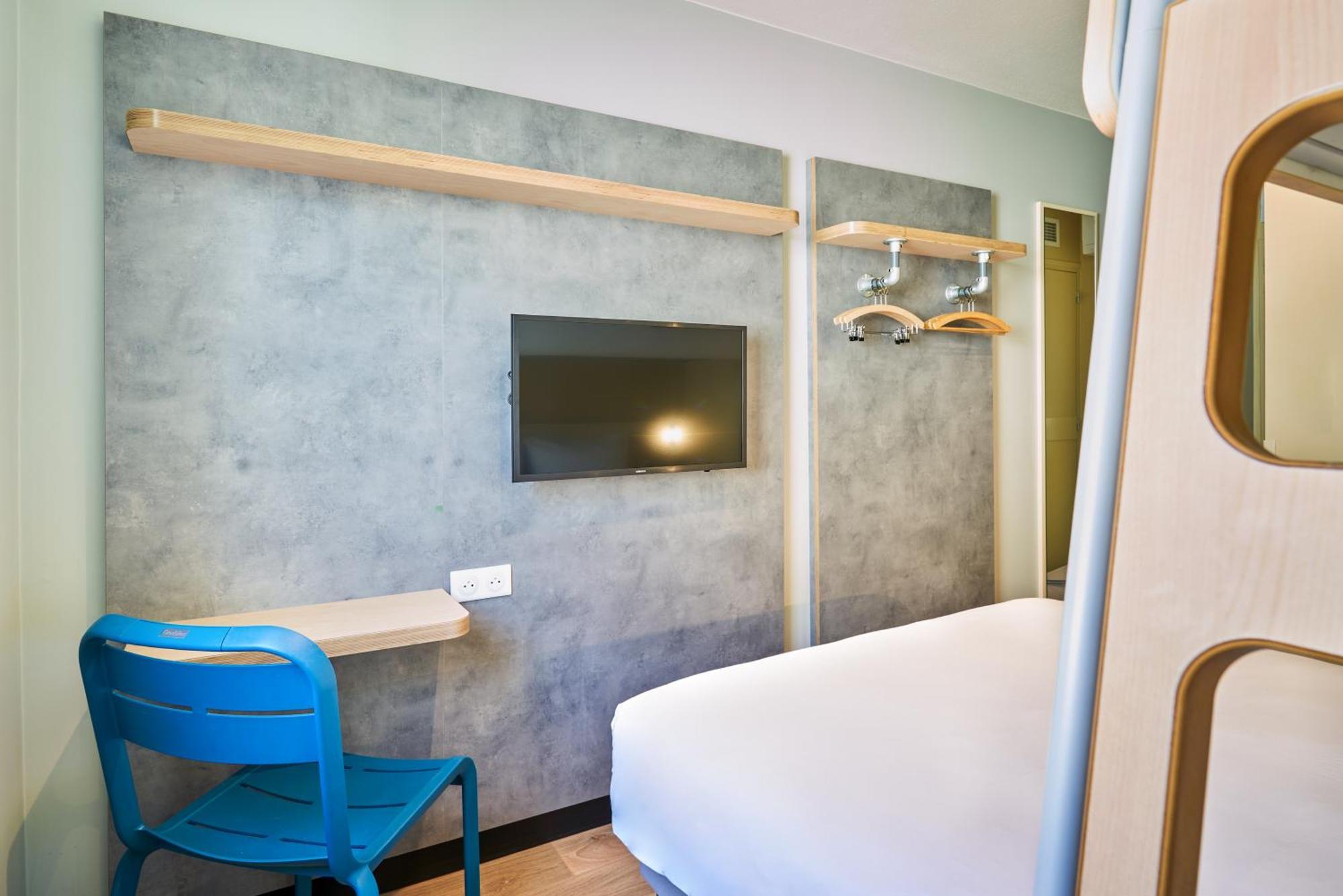 Room with One Queen Bed and One Bunk Bed
