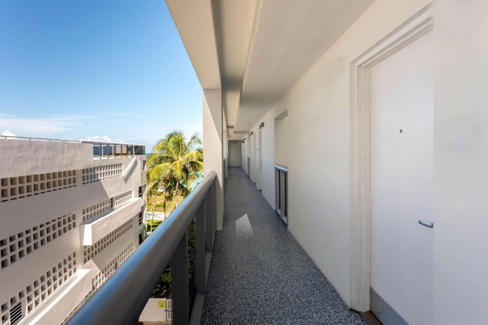 2 Queen Beds Partial Oceanview Balcony Exterior Wing,1622046300:JPEG