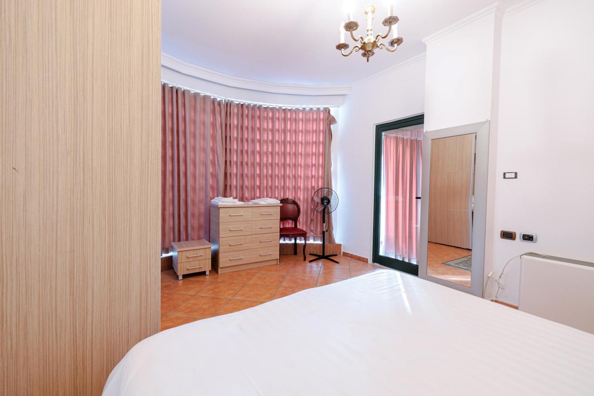 Two-Bedroom Apartment Balcony,1624802316:JPEG