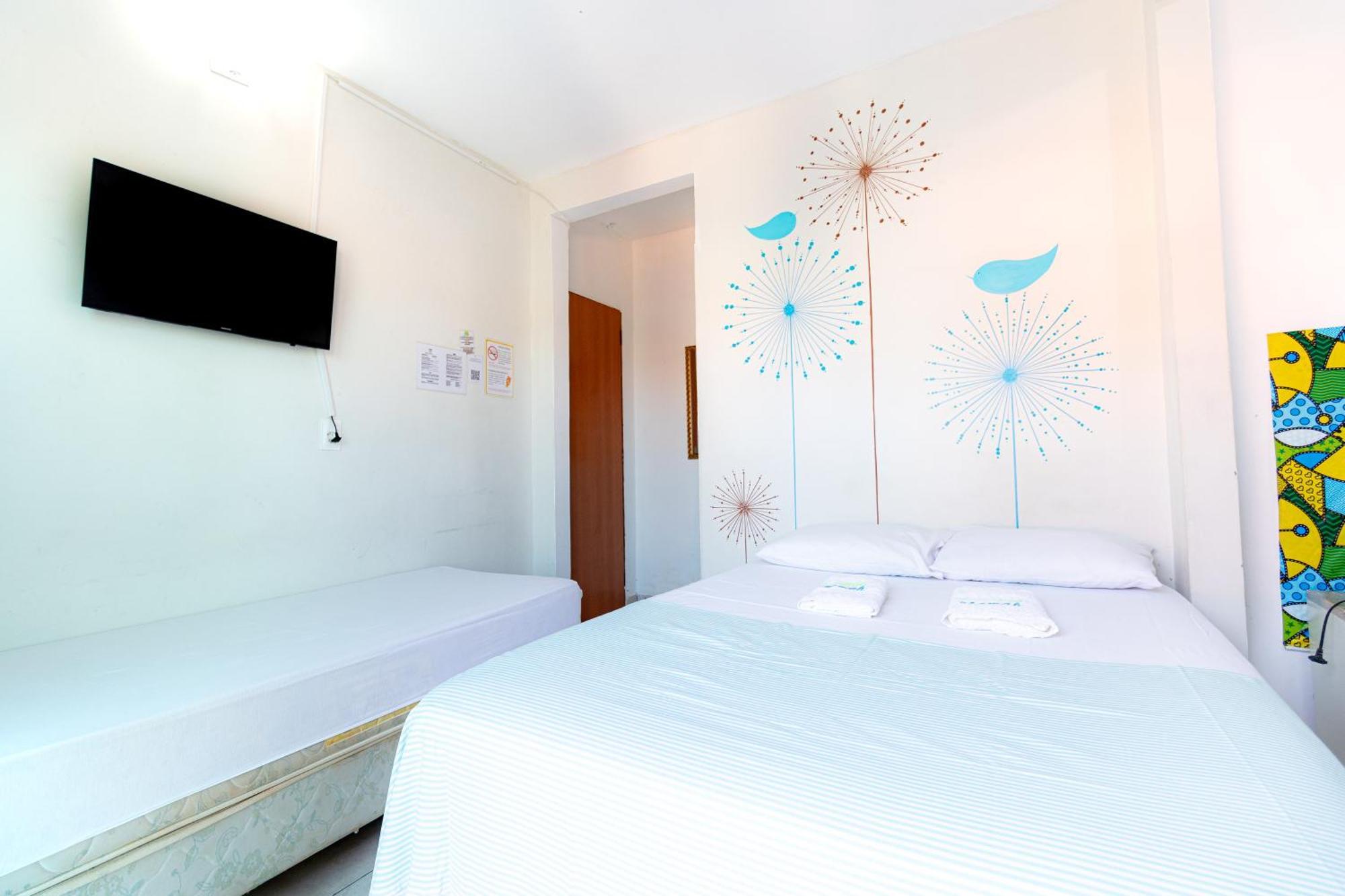 Quarto Triplo com Varanda