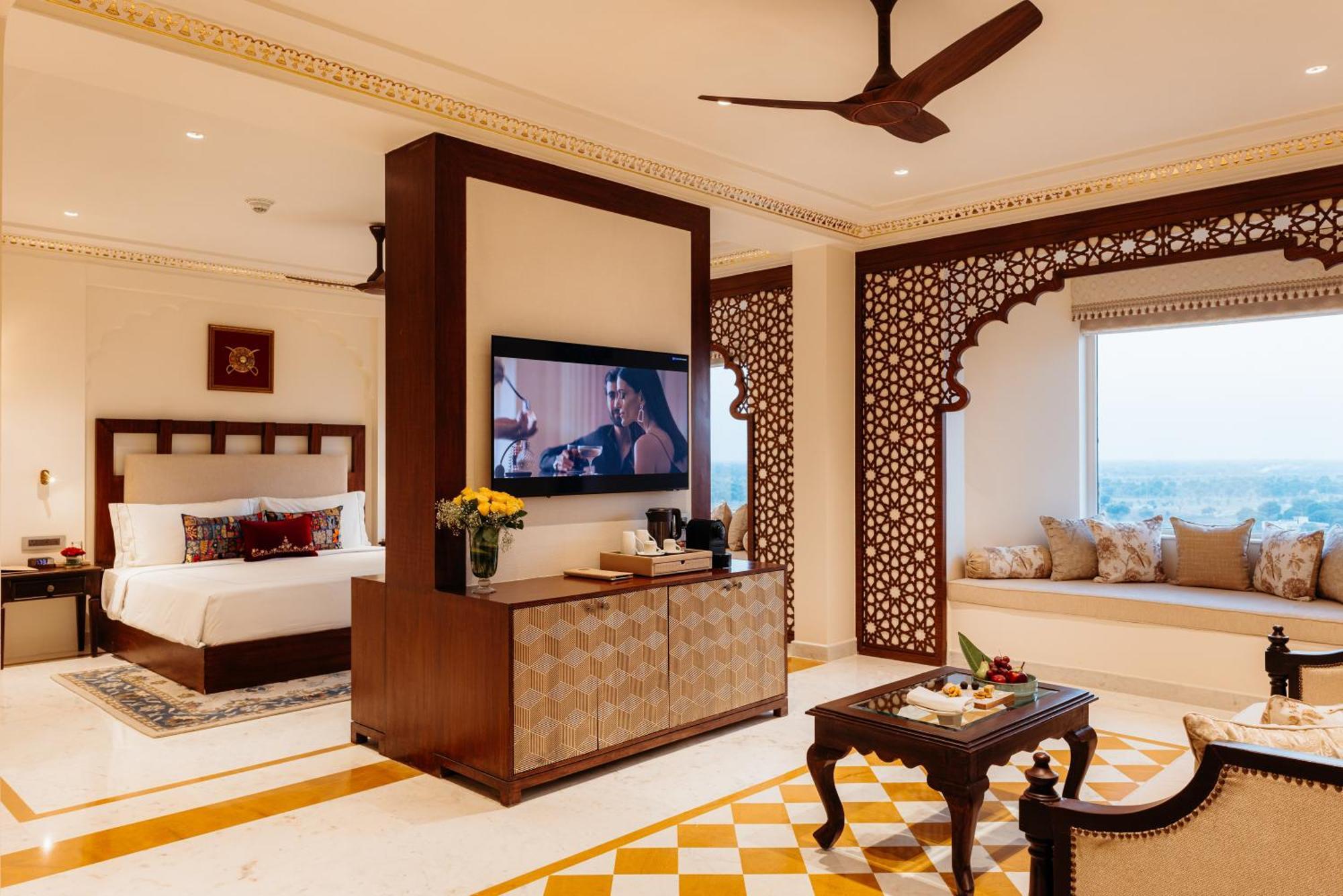 Jewel Bagh One Bedroom Suite Complimentary usage of Mini Bar once during the Complimentary Airport Pickup Drop or Local pickup up 20 KM radius,1663698228:JPEG