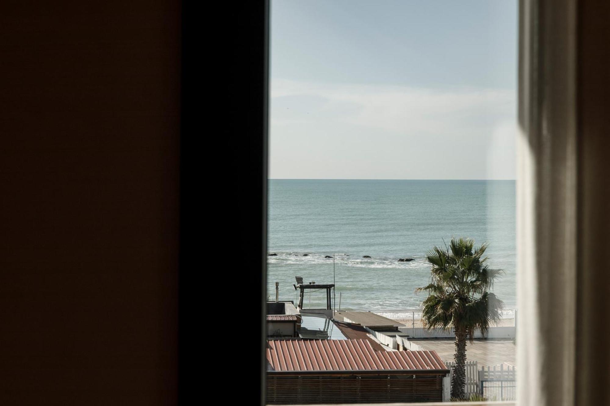 Deluxe tweepersoonskamer met balkon en uitzicht op zee