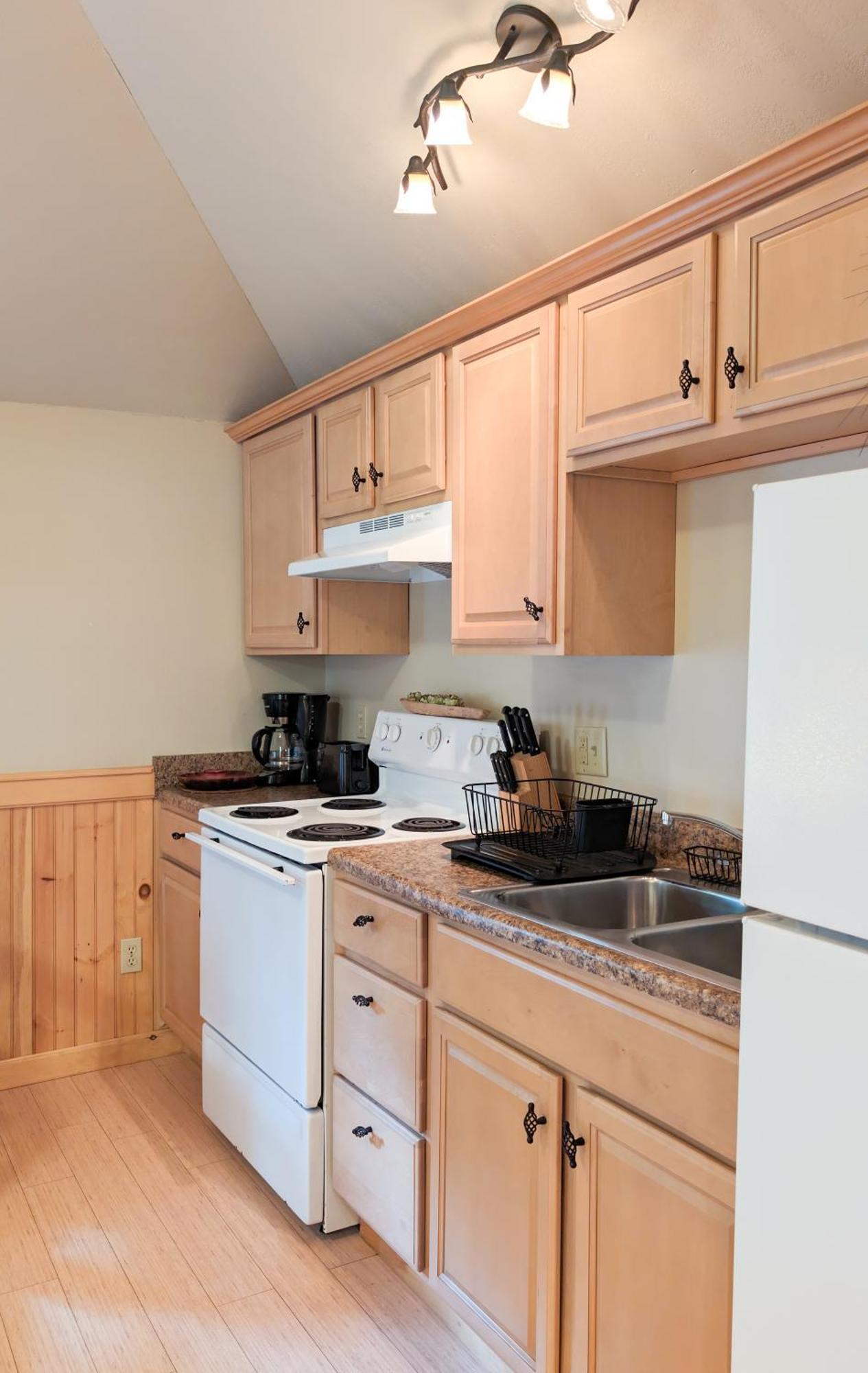 One Bedroom Cabin Living Room Kitchen & Small Patio