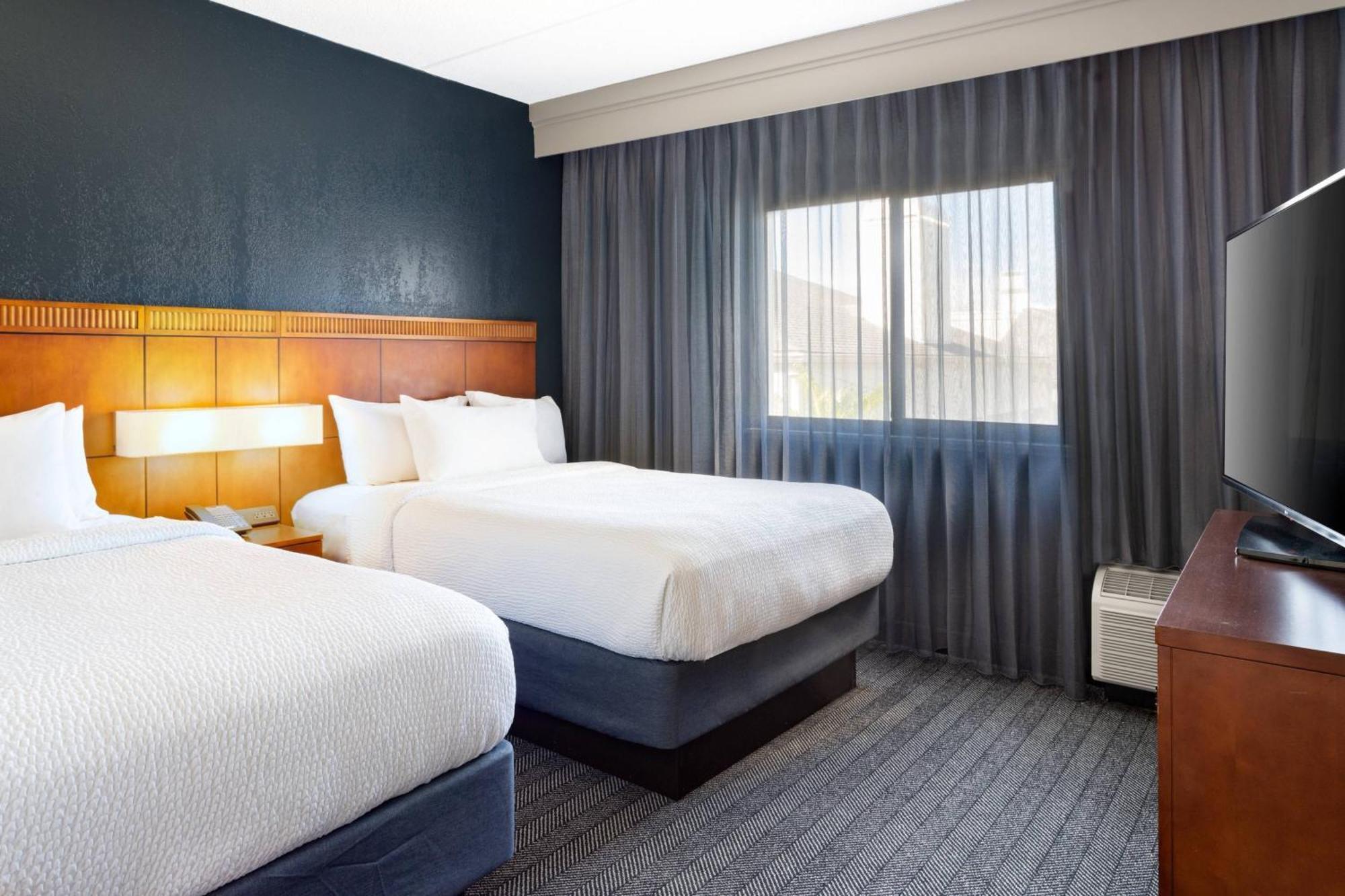 Suite met 2 Tweepersoonsbedden en een Slaapbank
