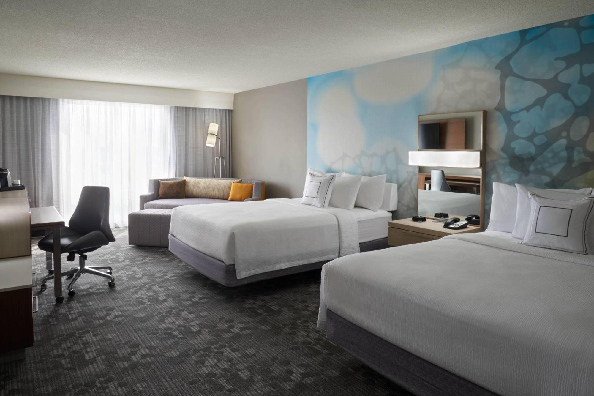 Larger Queen Room with Two Queen Beds and Sofa Bed