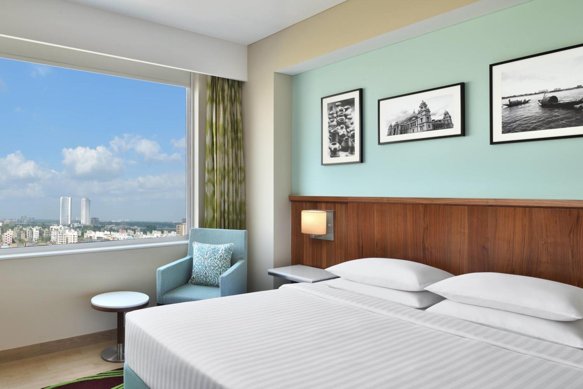 Fairfield Suite One-way airport transfer & INR 1000 Hotel Credit per