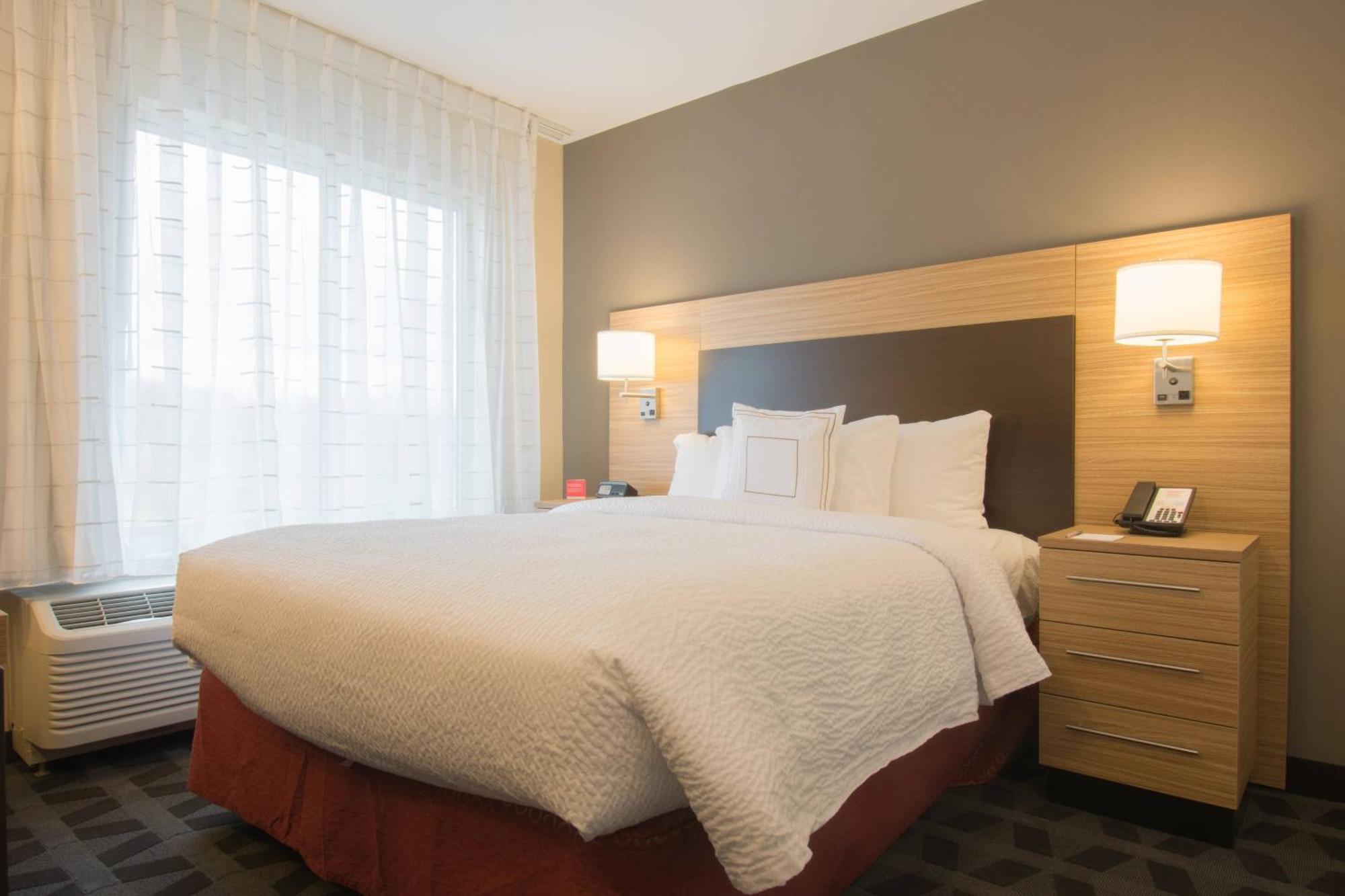 One Bedroom Suite with queen bed, sofa bed and city view
