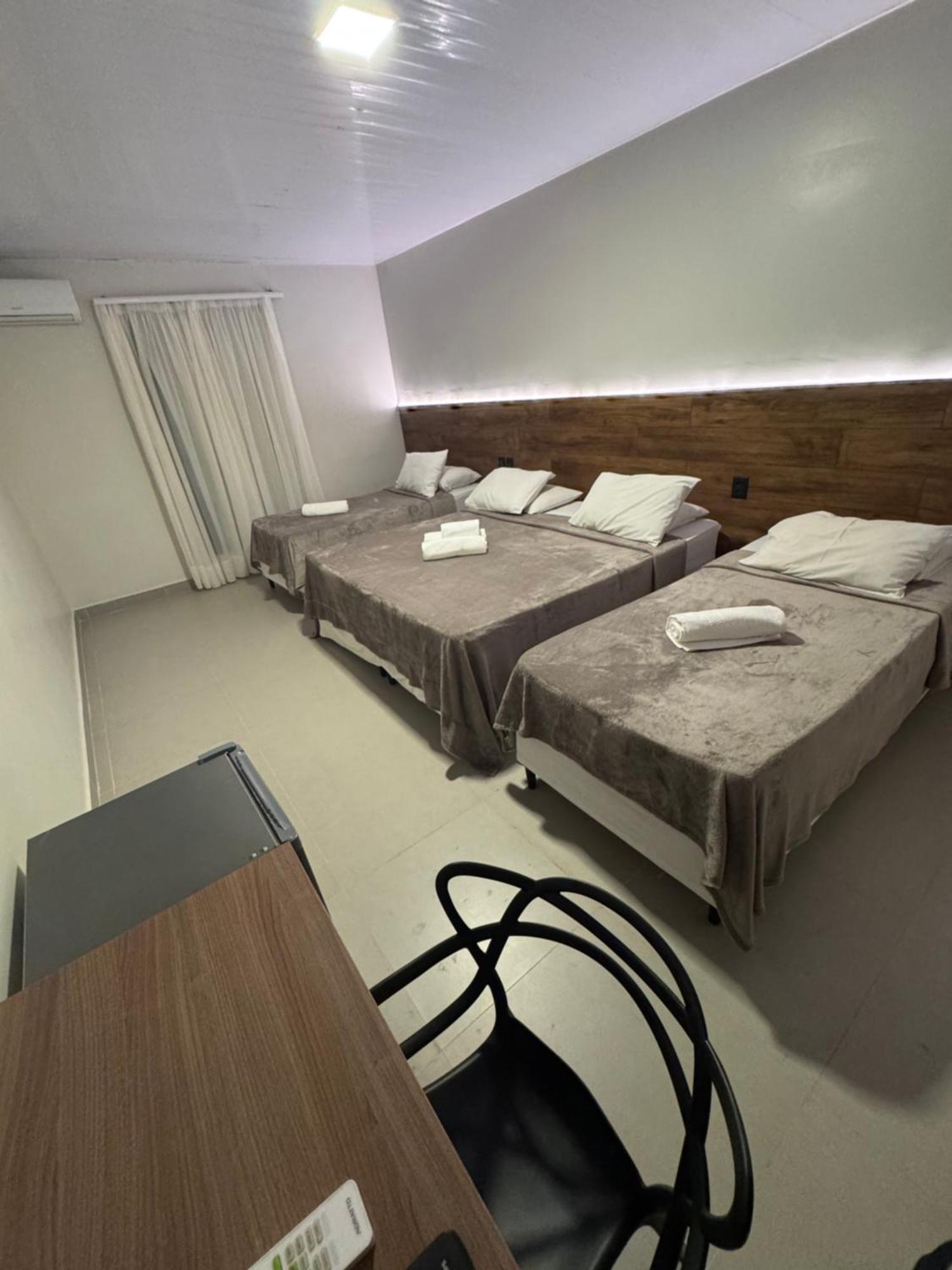 Quarto Quádruplo com Varanda