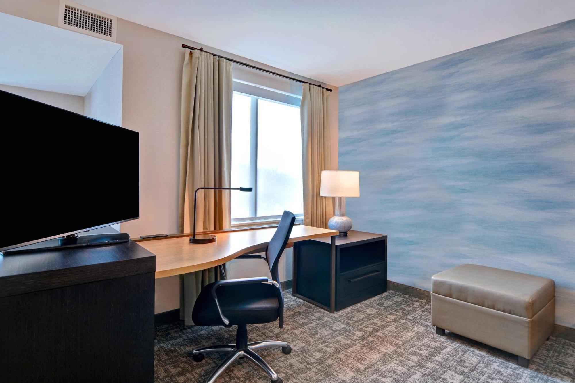 Studio with 2 queen beds, sofa bed, water view and balcony