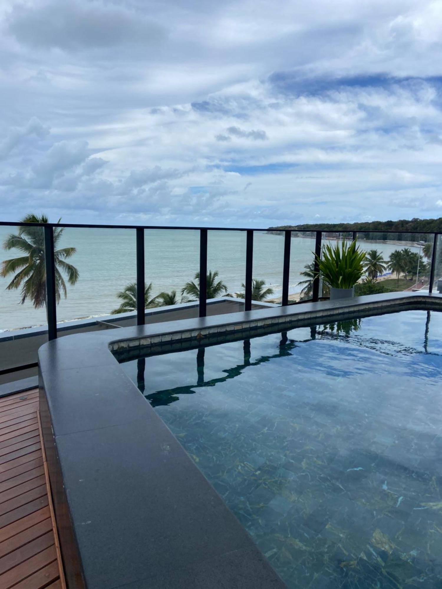 Quarto Quádruplo com Vista do Mar.