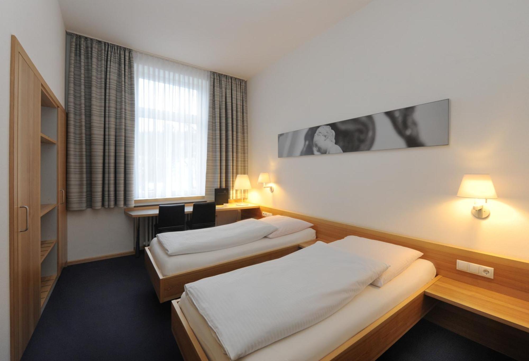 Zweibettzimmer mit eigenem Bad
