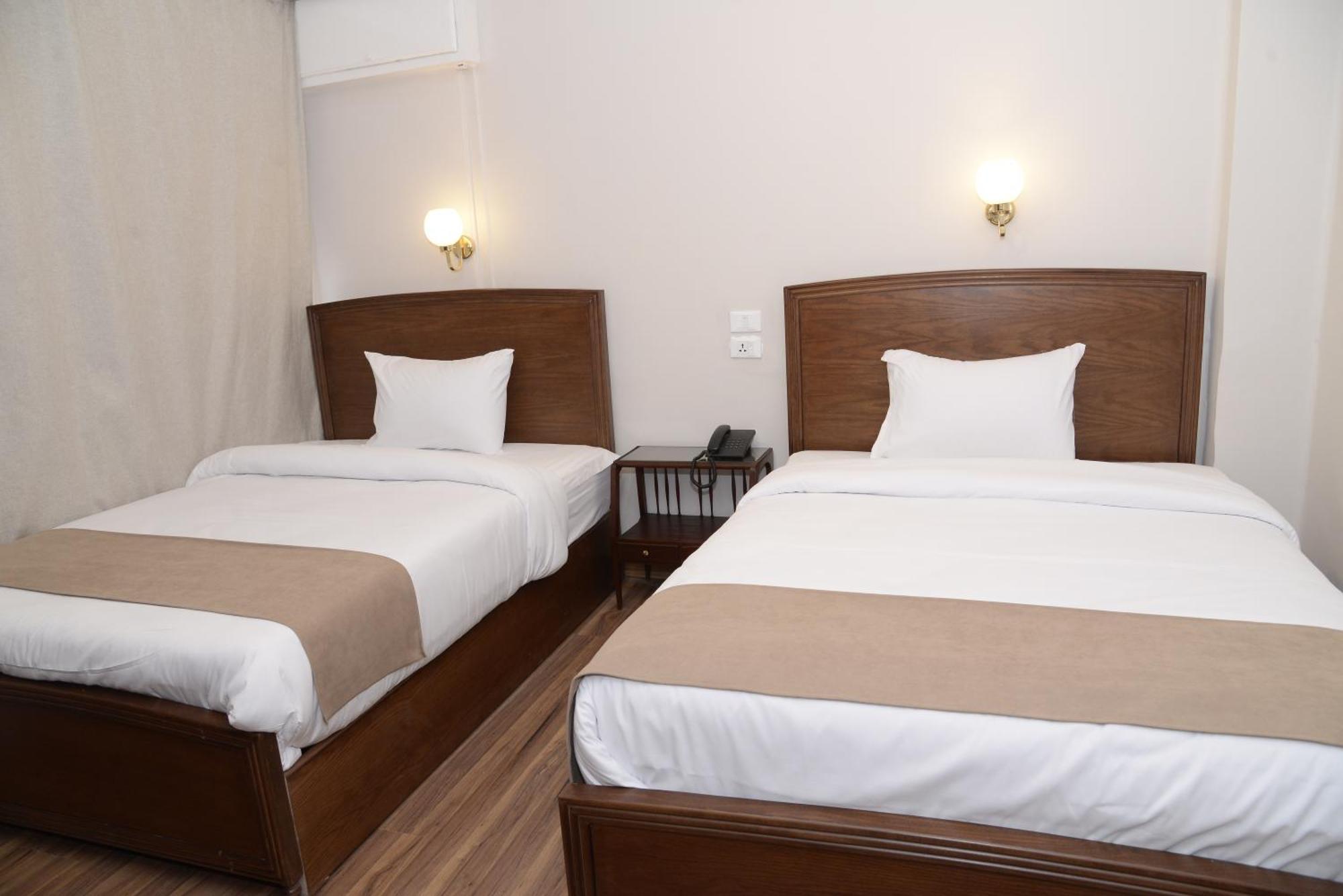 Tweepersoonskamer met 1 of 2 Bedden en Badkamer