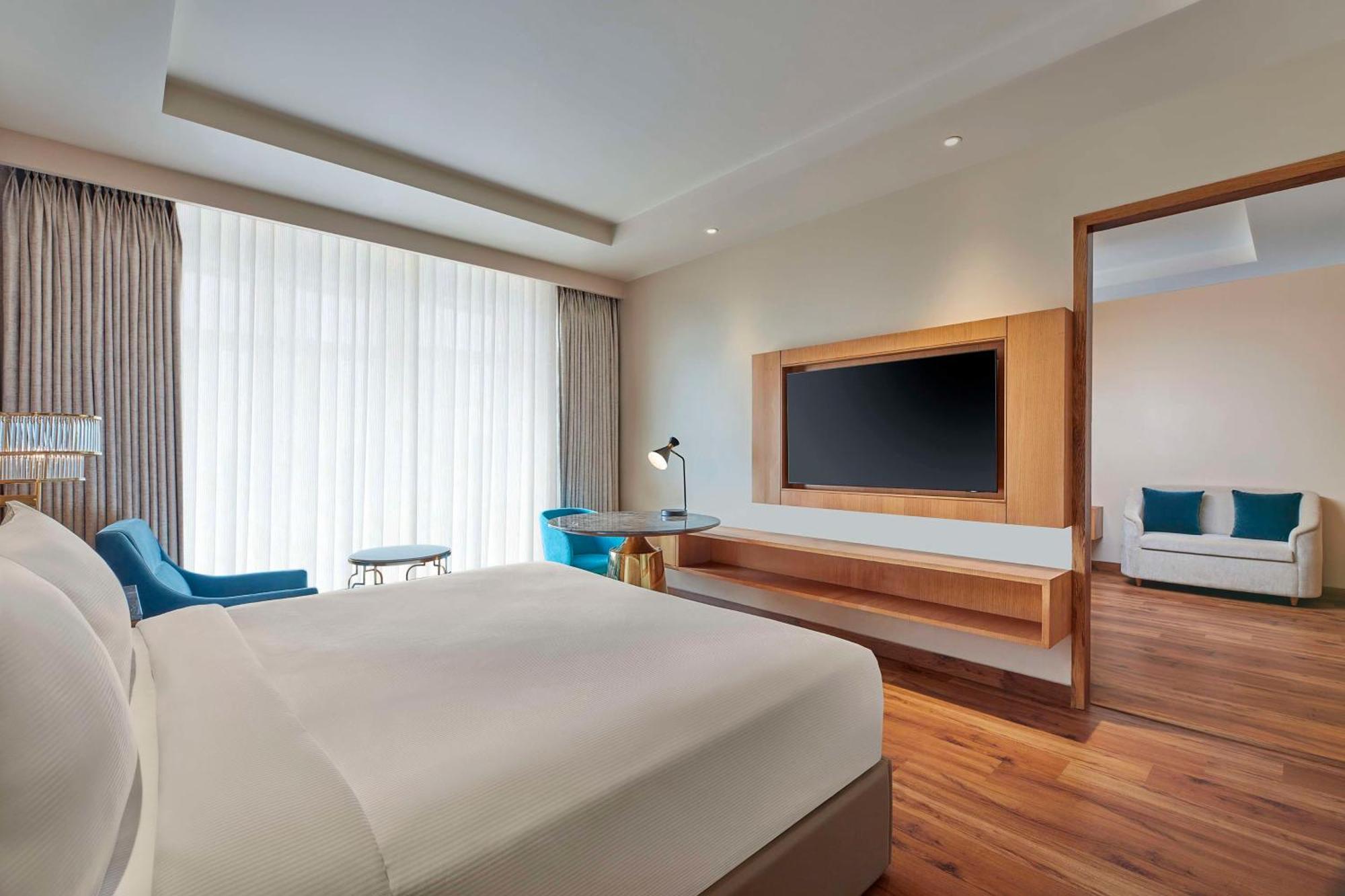 Business Suite with Pool View | INR 500/- credit on food & beverages per stay | 15% discount on spa & laundry | Happy Hour till 6pm 1+1 on IMFL and 2+1 on Beer