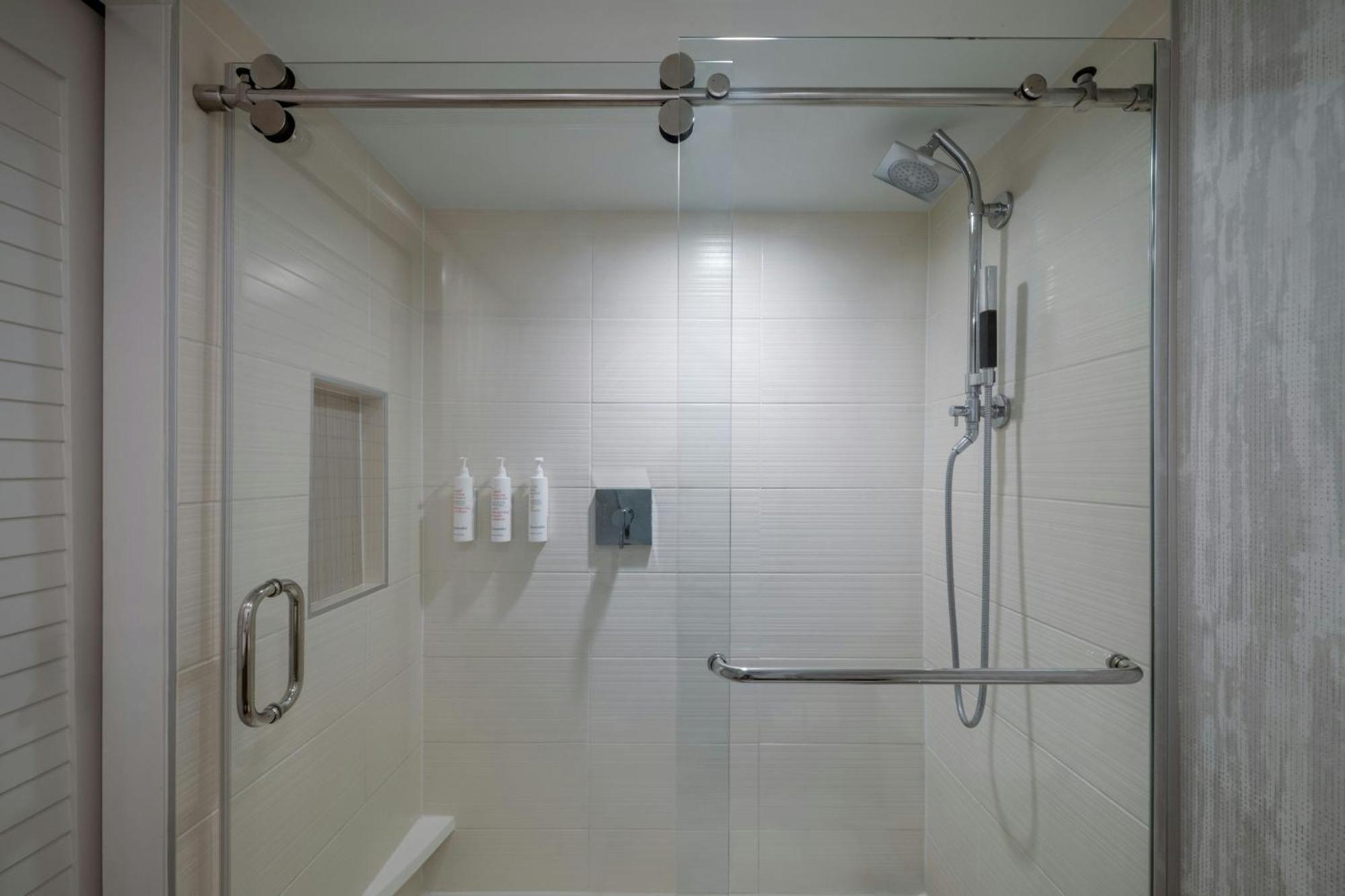 One-Bedroom Suite Waterfront View Sofa Bed Mobility Accessible Roll Shower