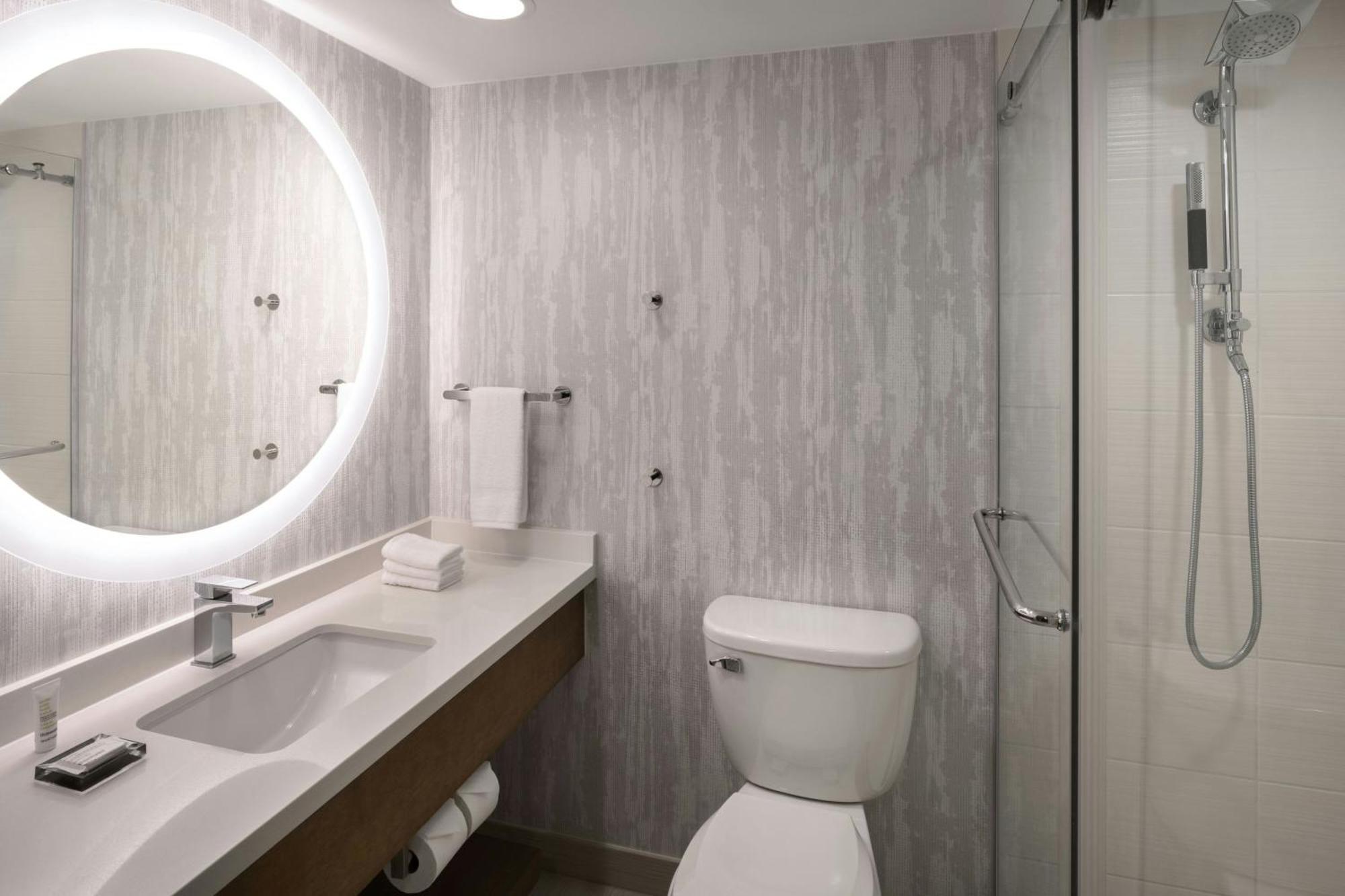One-Bedroom Suite Waterfront View Sofa Bed Mobility Accessible Roll Shower