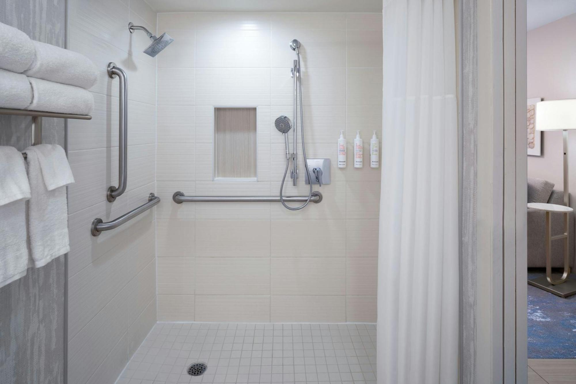 One-Bedroom Suite Waterfront View Sofa Bed Mobility Accessible Roll Shower
