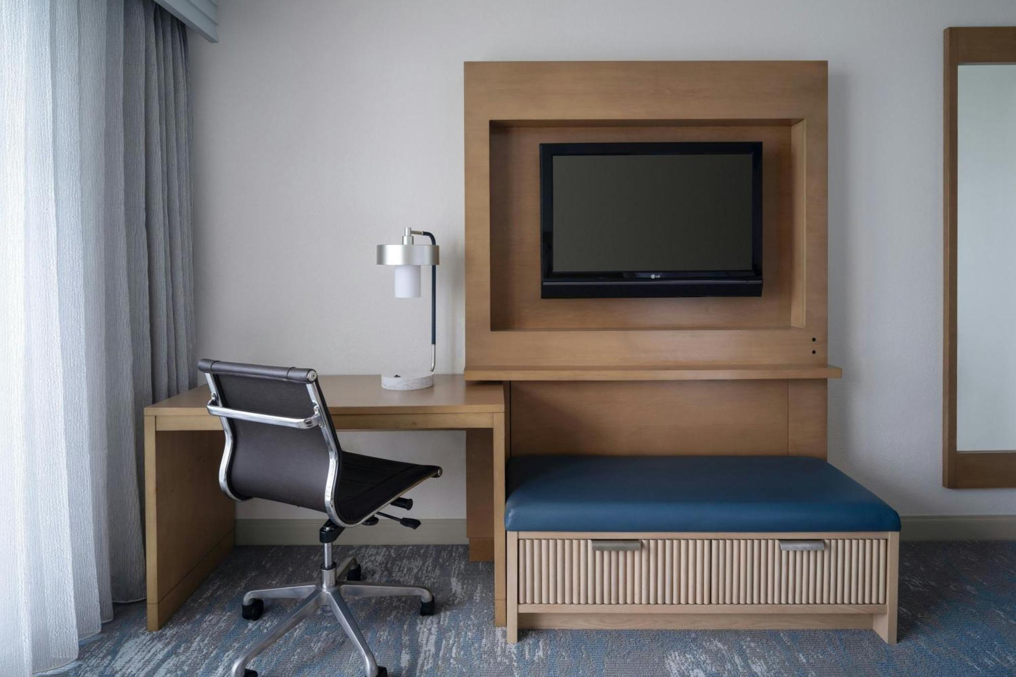 One-Bedroom Suite Waterfront View Sofa Bed Mobility Accessible Roll Shower