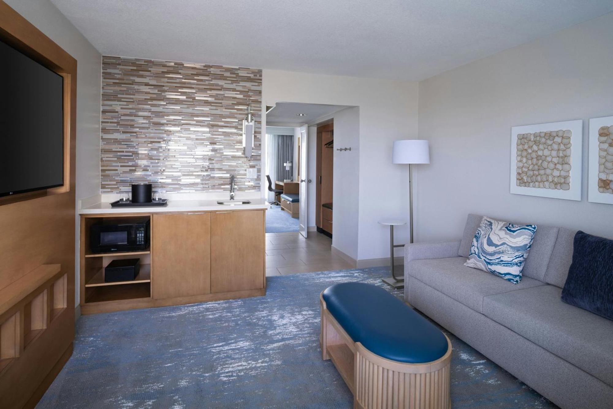 One-Bedroom Suite Waterfront View Sofa Bed Mobility Accessible Roll Shower