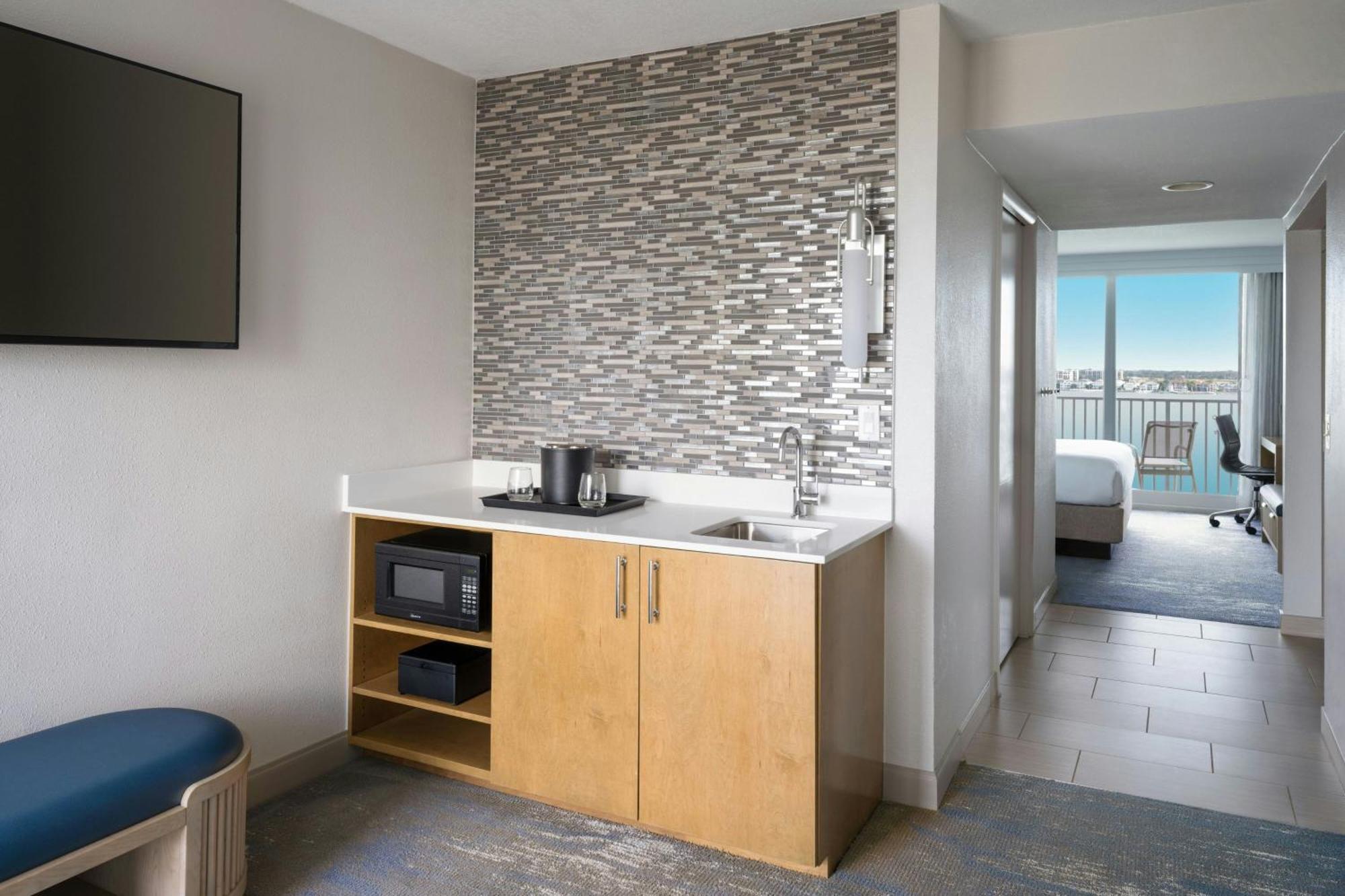 One-Bedroom Suite Waterfront View Sofa Bed Mobility Accessible Roll Shower