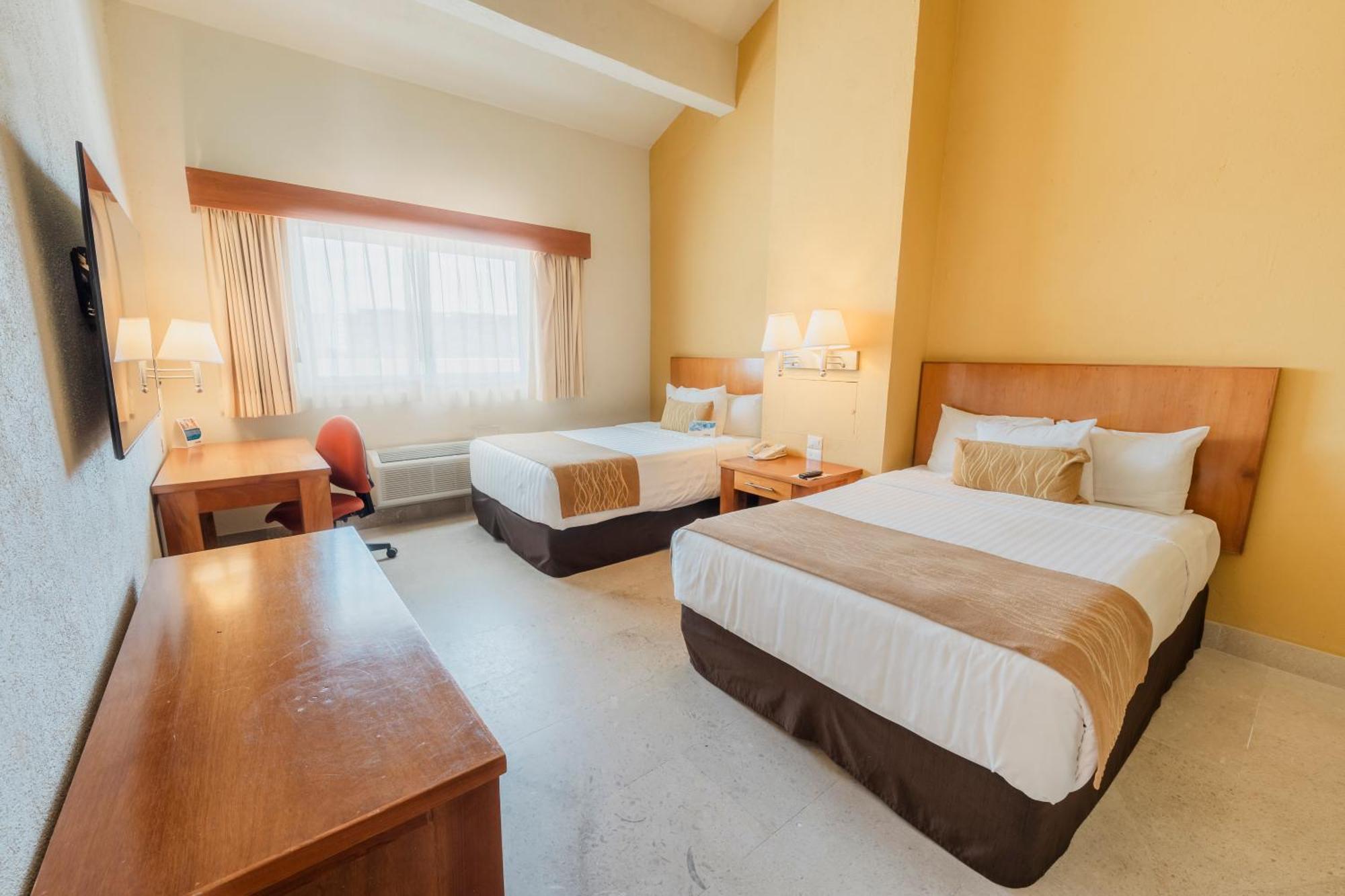 Quarto Duplo com 2 Camas de Casal