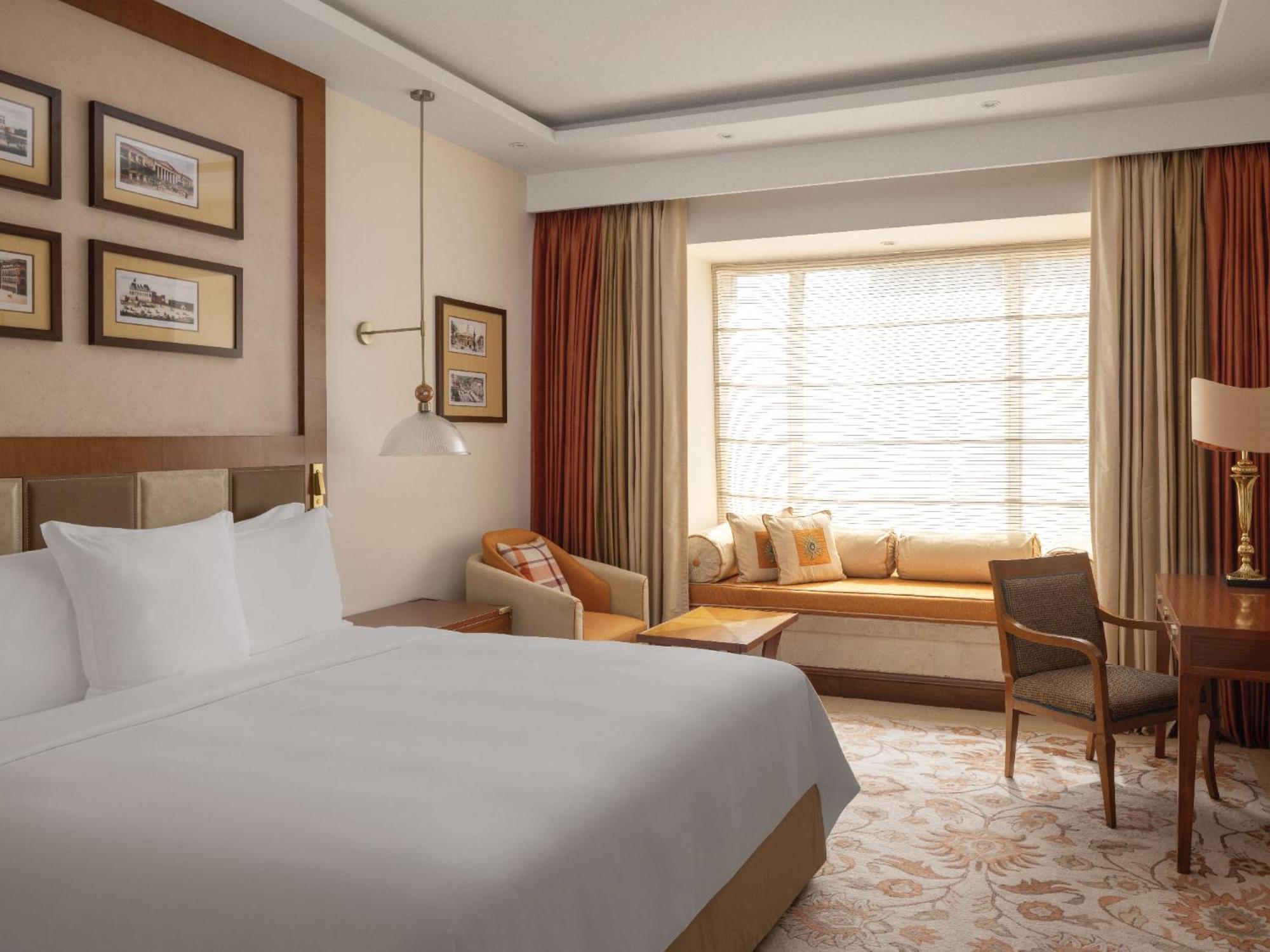 Executive Club King Room with Skyline View with 15% off on Spa, Laundry, Food & Soft Beverage and Buy 1 Get 1 Luxury Happy Hours from 6 pm to 8pm