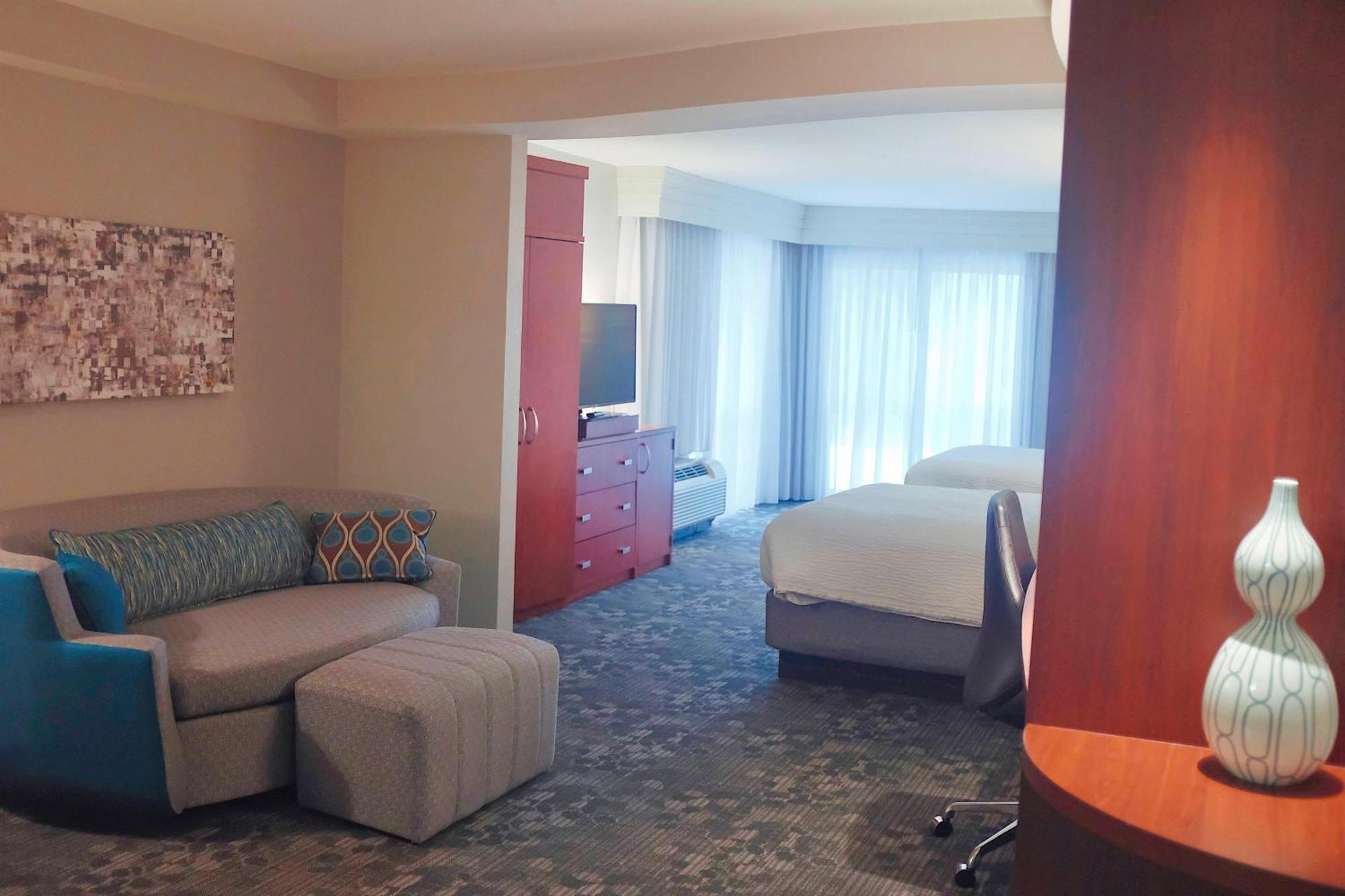 Queen Suite with Two Queen Beds and Sofa Bed