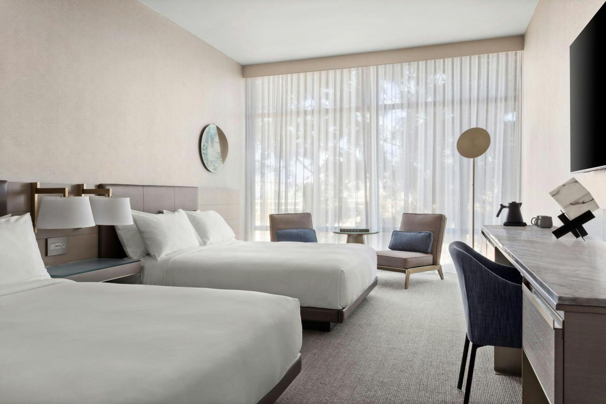 Queen Guest Room with 2 Queen Beds and Courtyard View