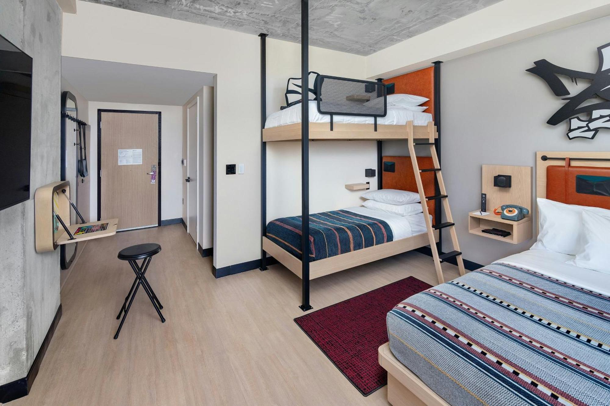 Room One Queen Bed One Set of Bunk Beds
