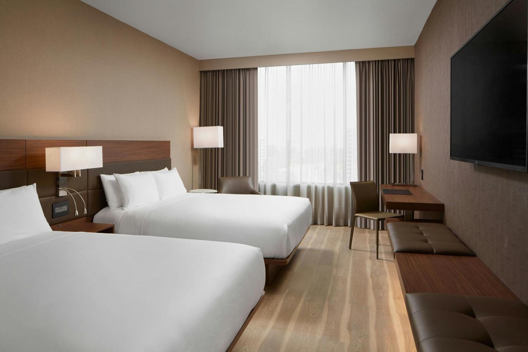 Standard Queen Room with Two Queen Beds and City View