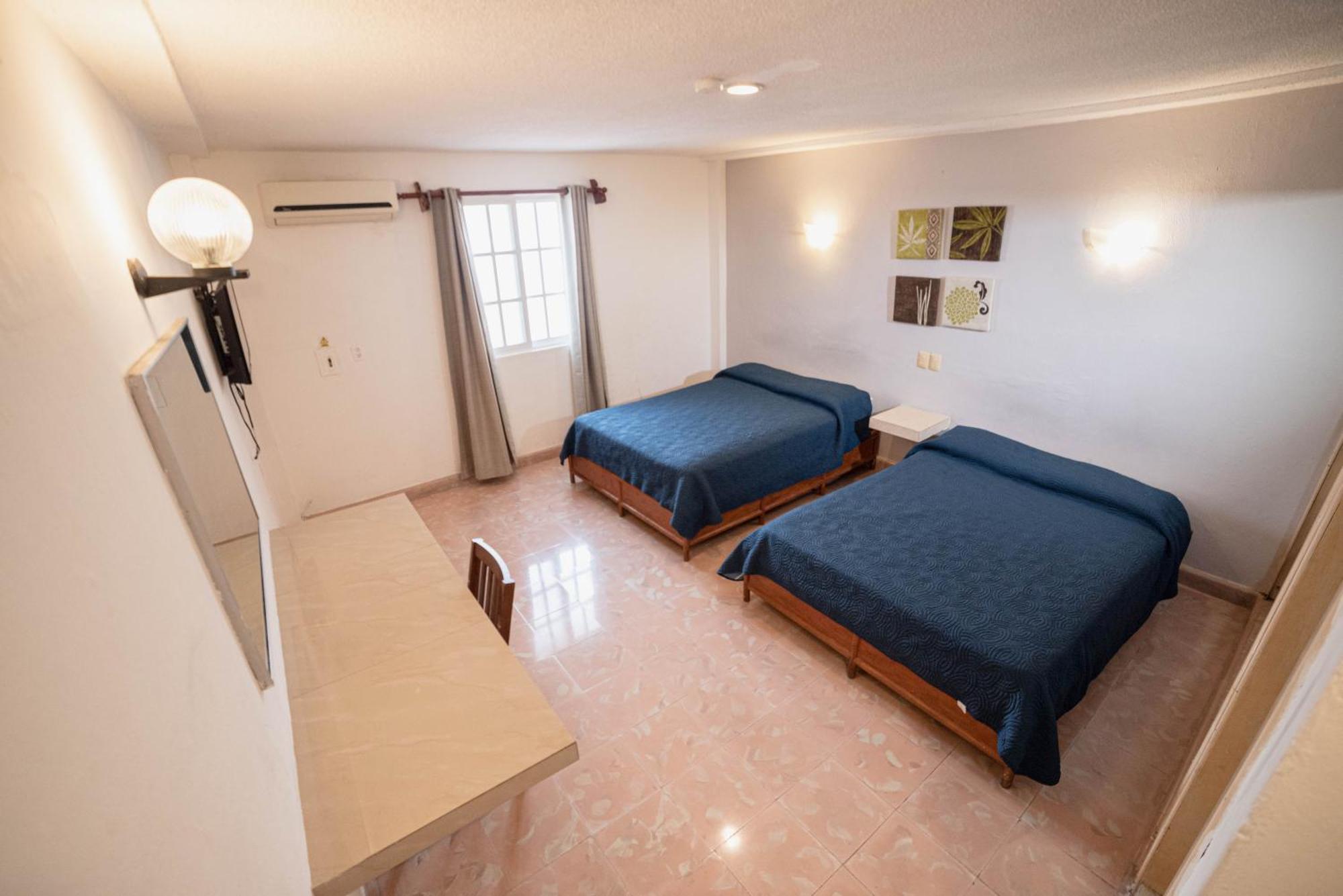 Habitación Doble - 2 camas dobles