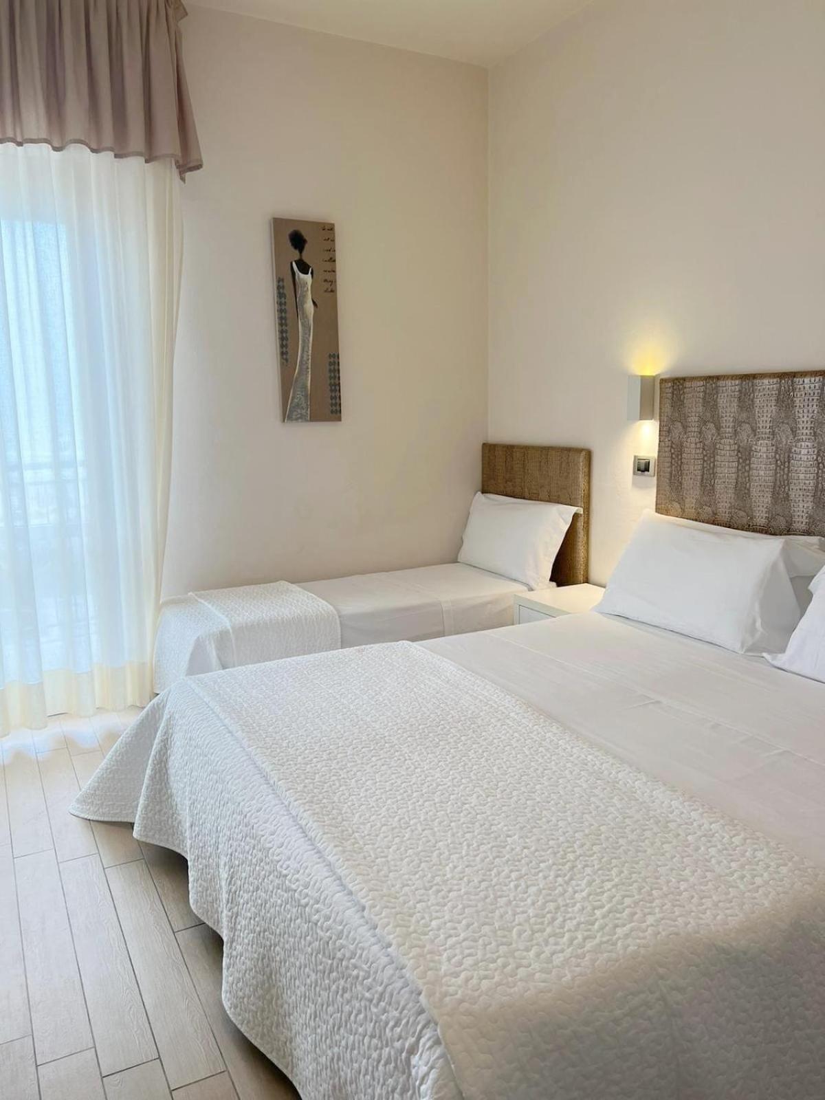 Dreibettzimmer mit Meerblick
