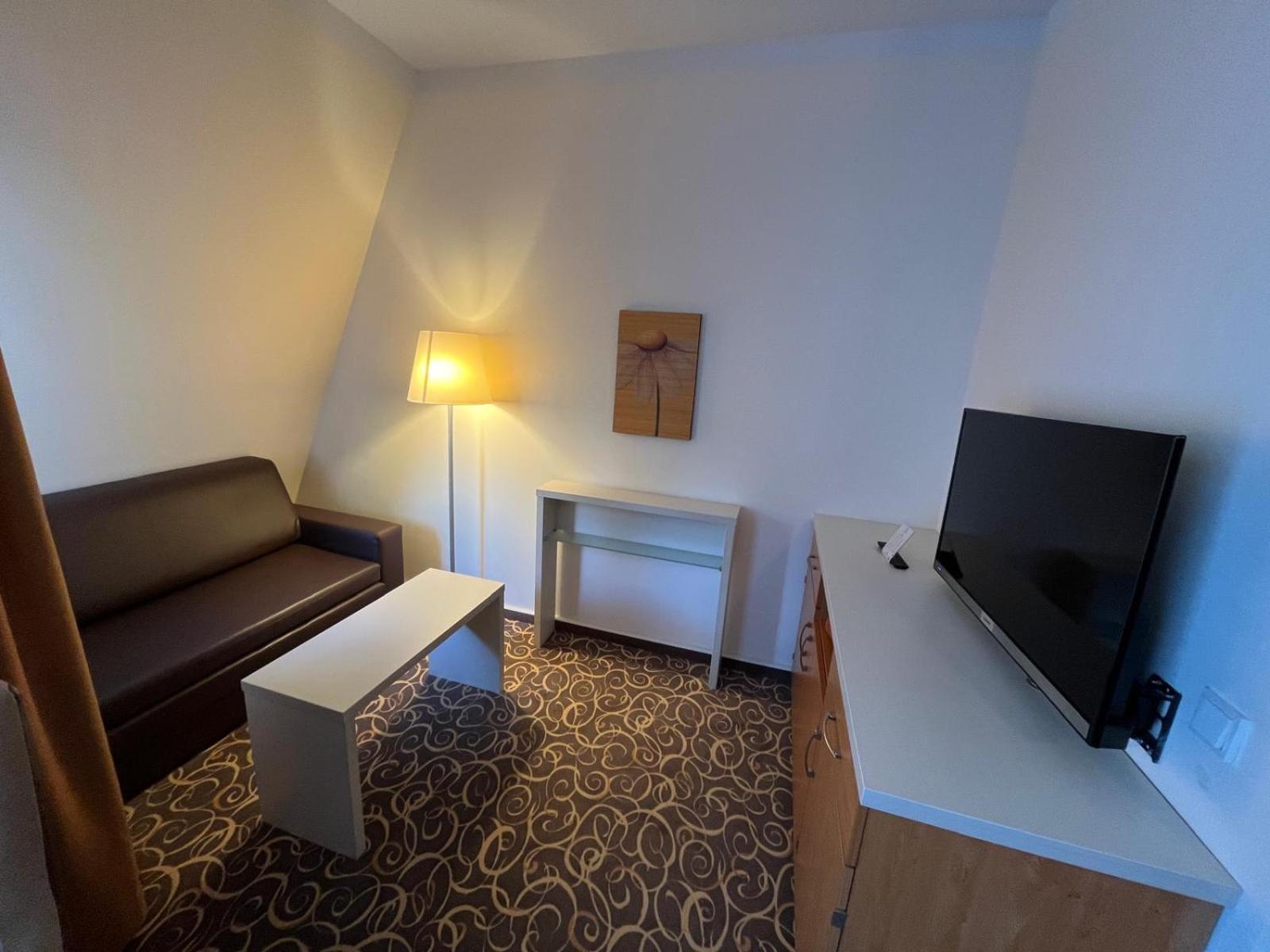 Dreibettzimmer mit Balkon