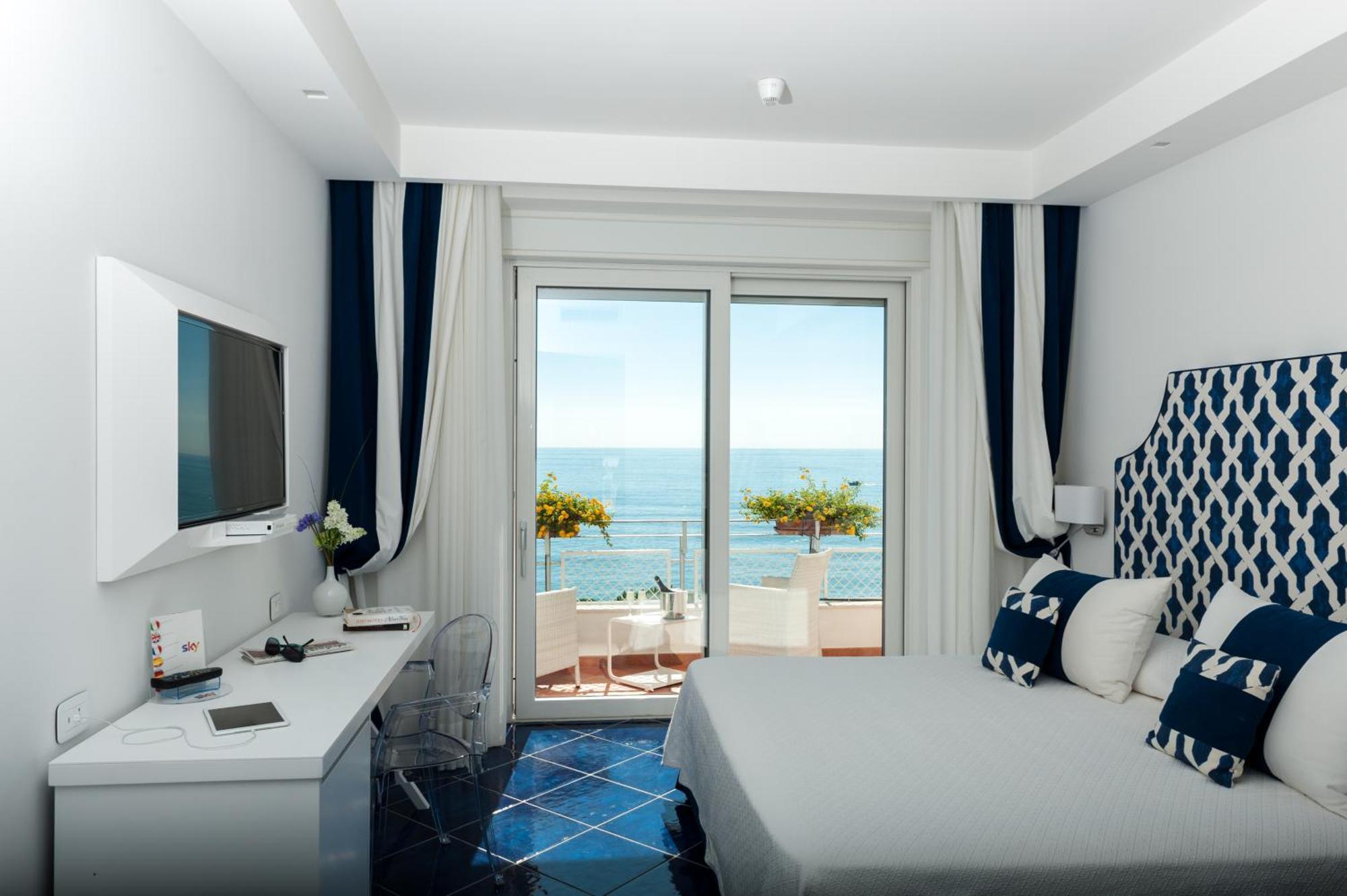 Deluxe Triple Room with Balcony & Sea View