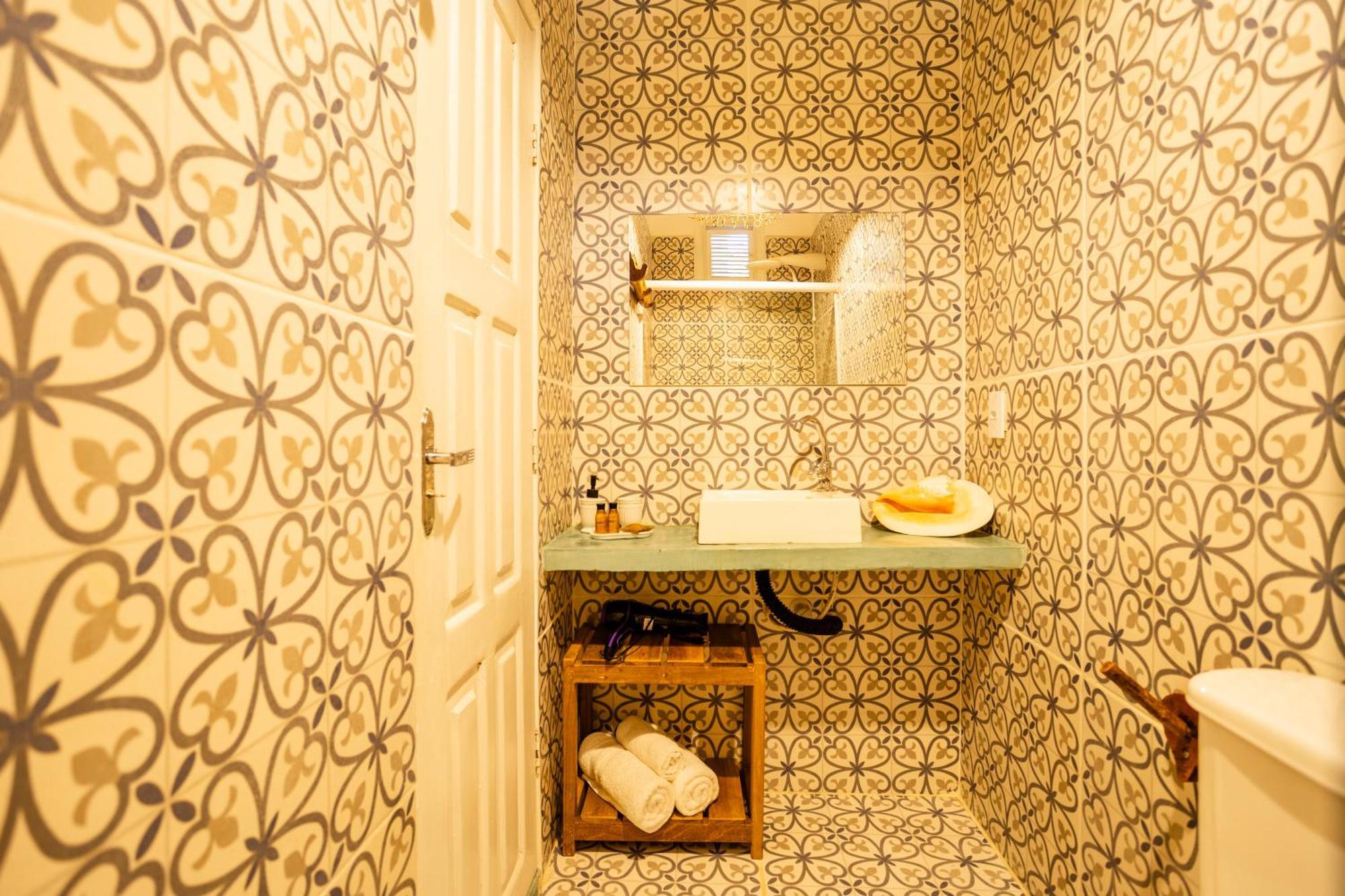 Quarto Triplo com Vista para a Piscina