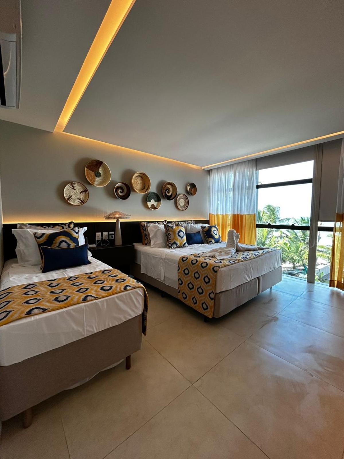 Quarto Triplo Deluxe com Vista do Mar