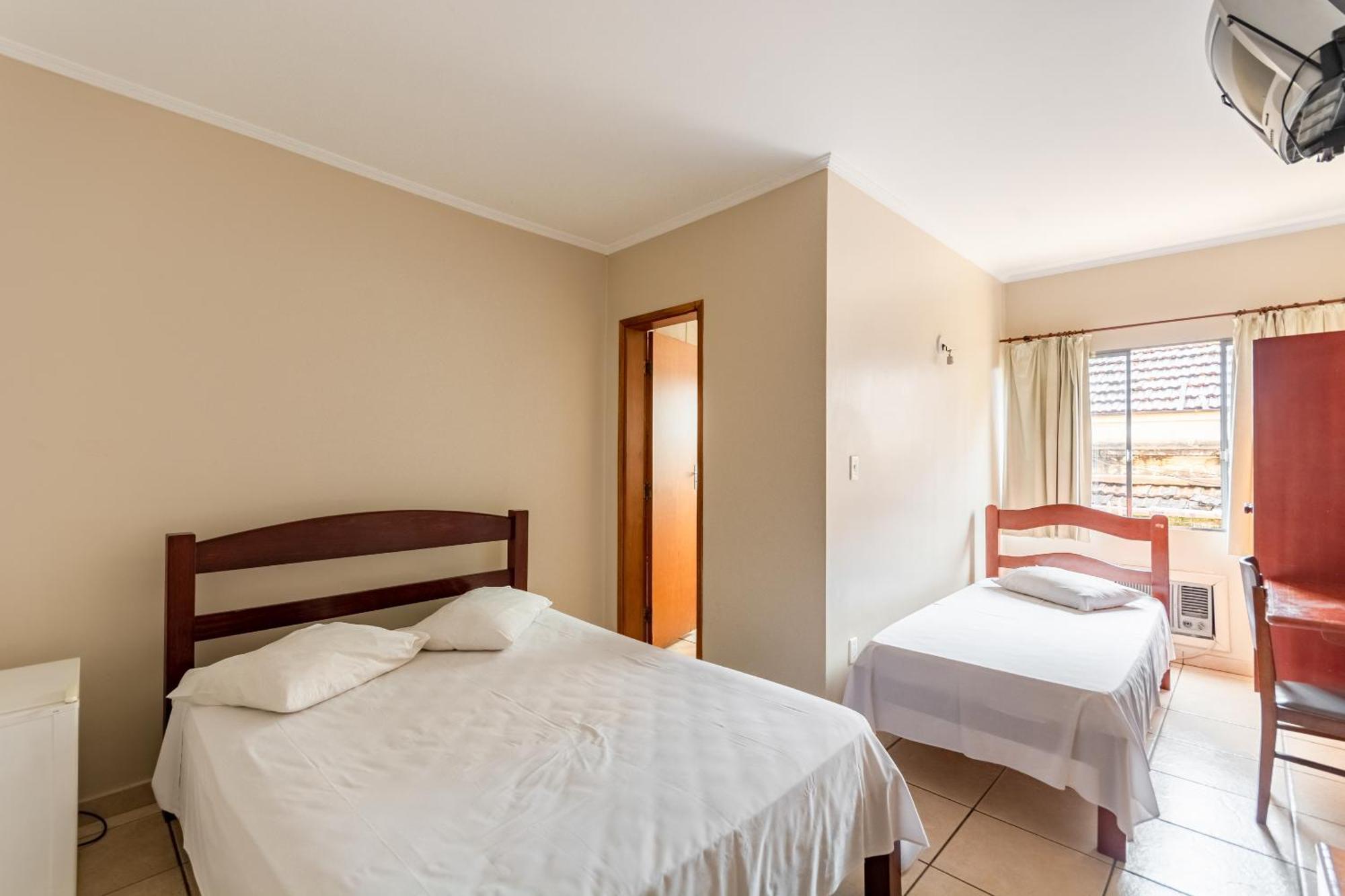Quadruple Room (1 Double bed + 2 Single beds)