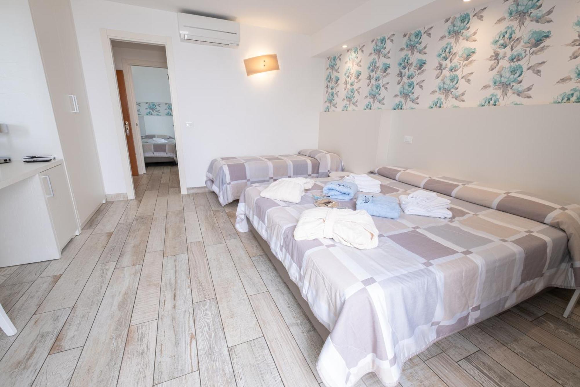 Deluxe Dreibettzimmer mit Meerblick