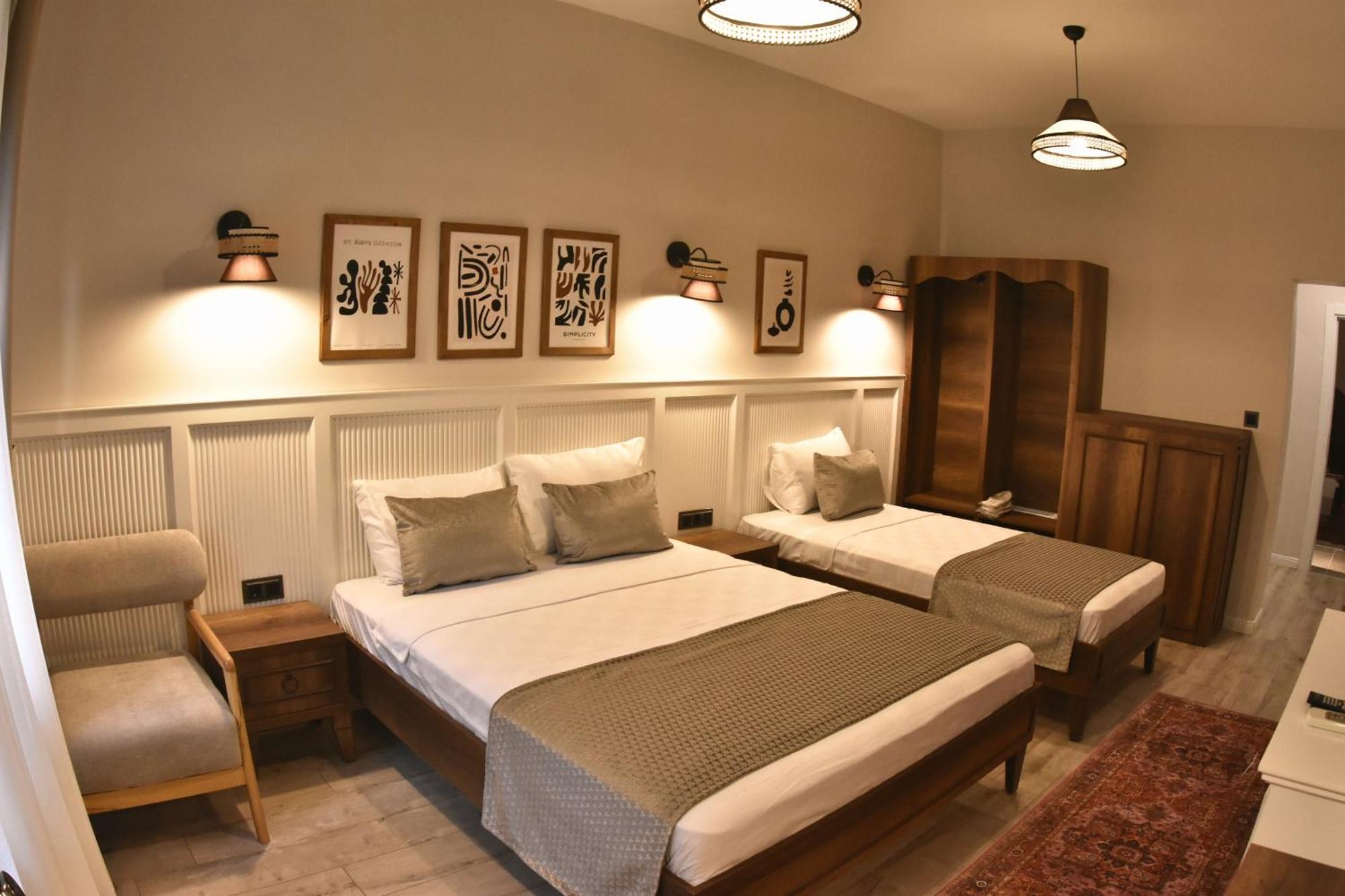 Deluxe Üç Kişilik Oda