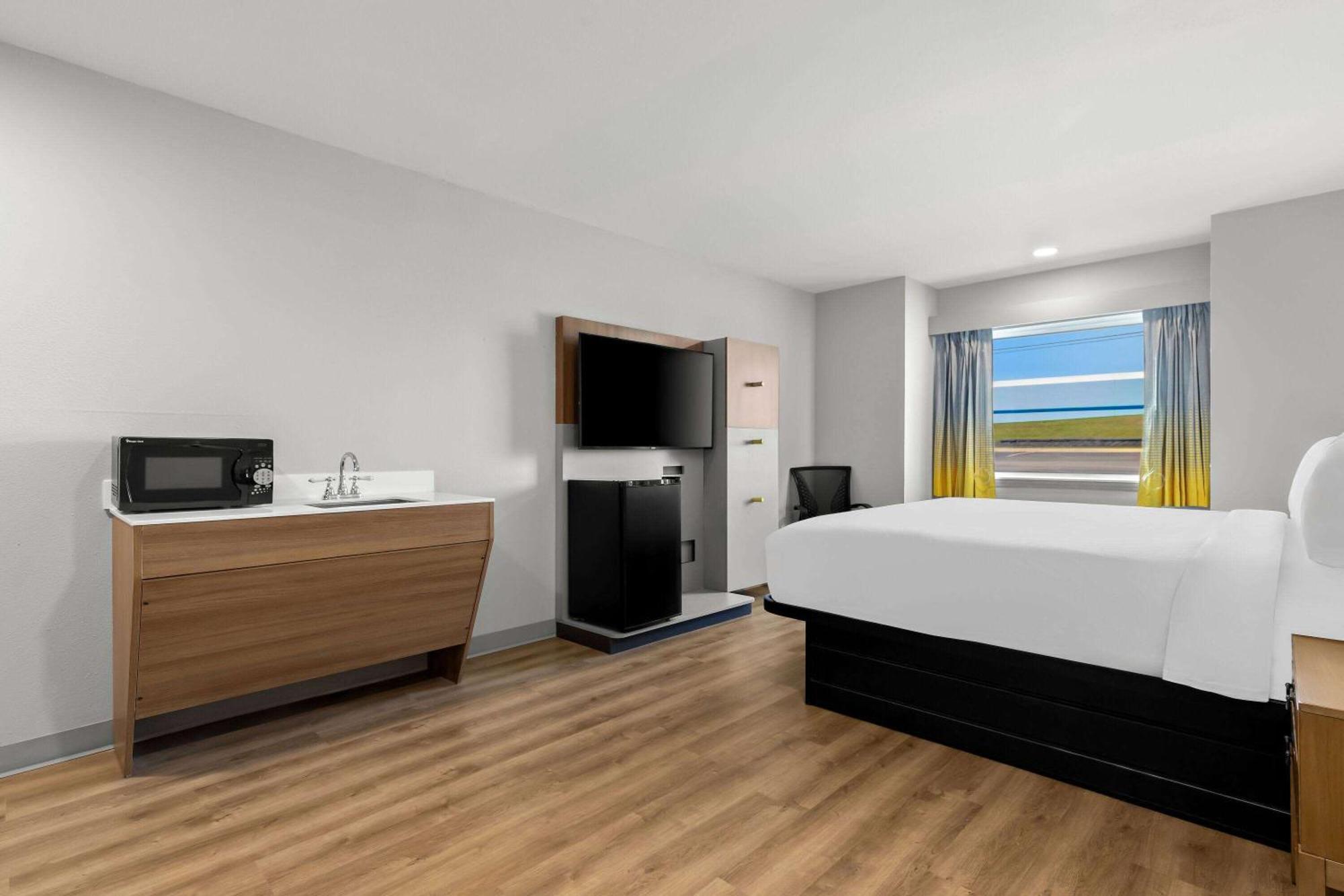 King Suite with One King Bed and Bathtub with Grab Bars - Mobility Accessible - Non-Smoking