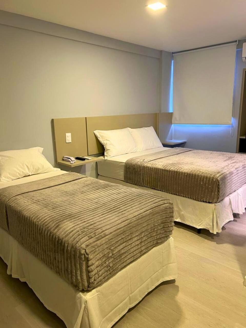 Quarto Duplo com Cama Extra
