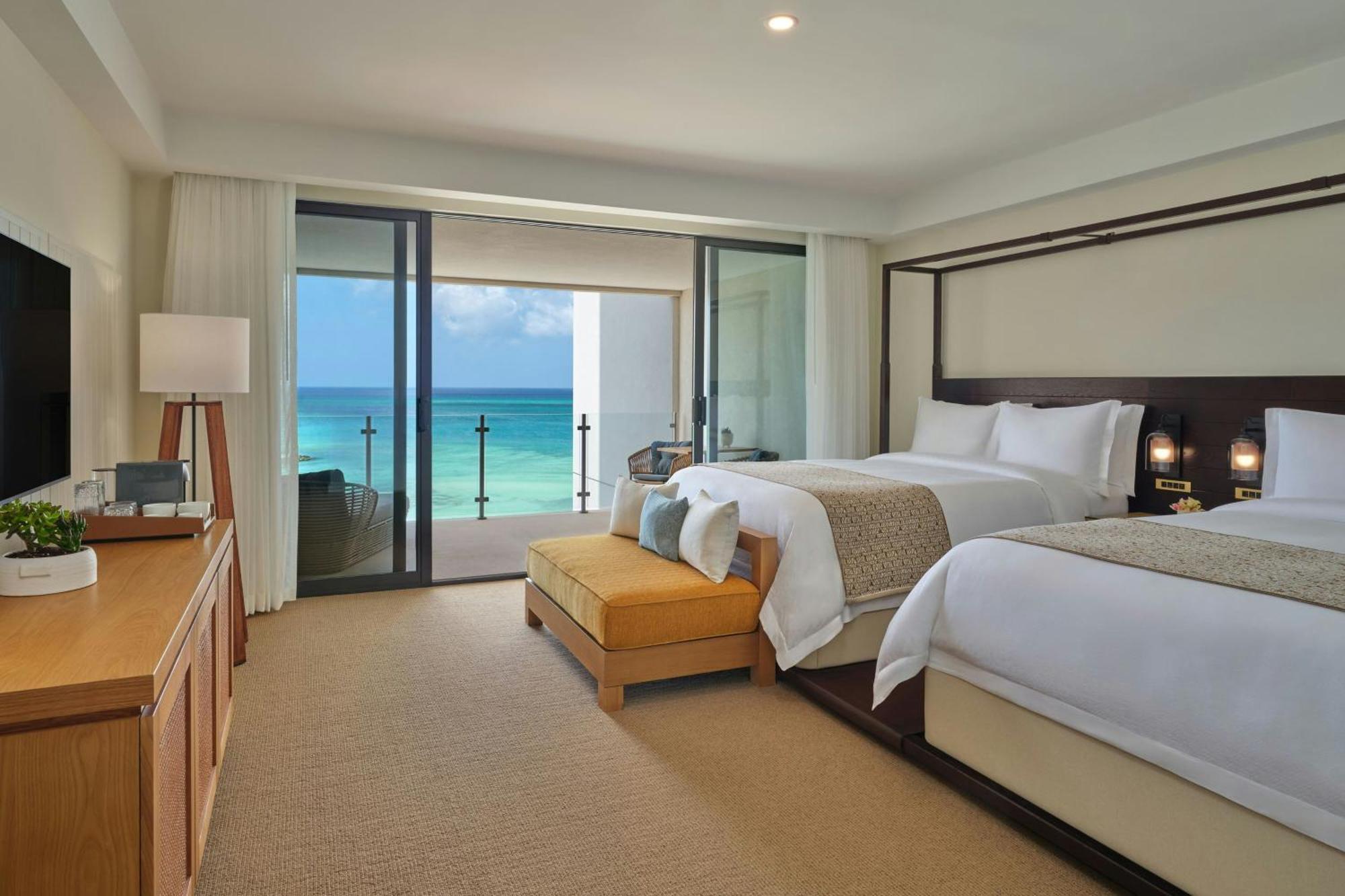 Deluxe Double Room with Two Double Beds, Balcony and Partial Ocean View
