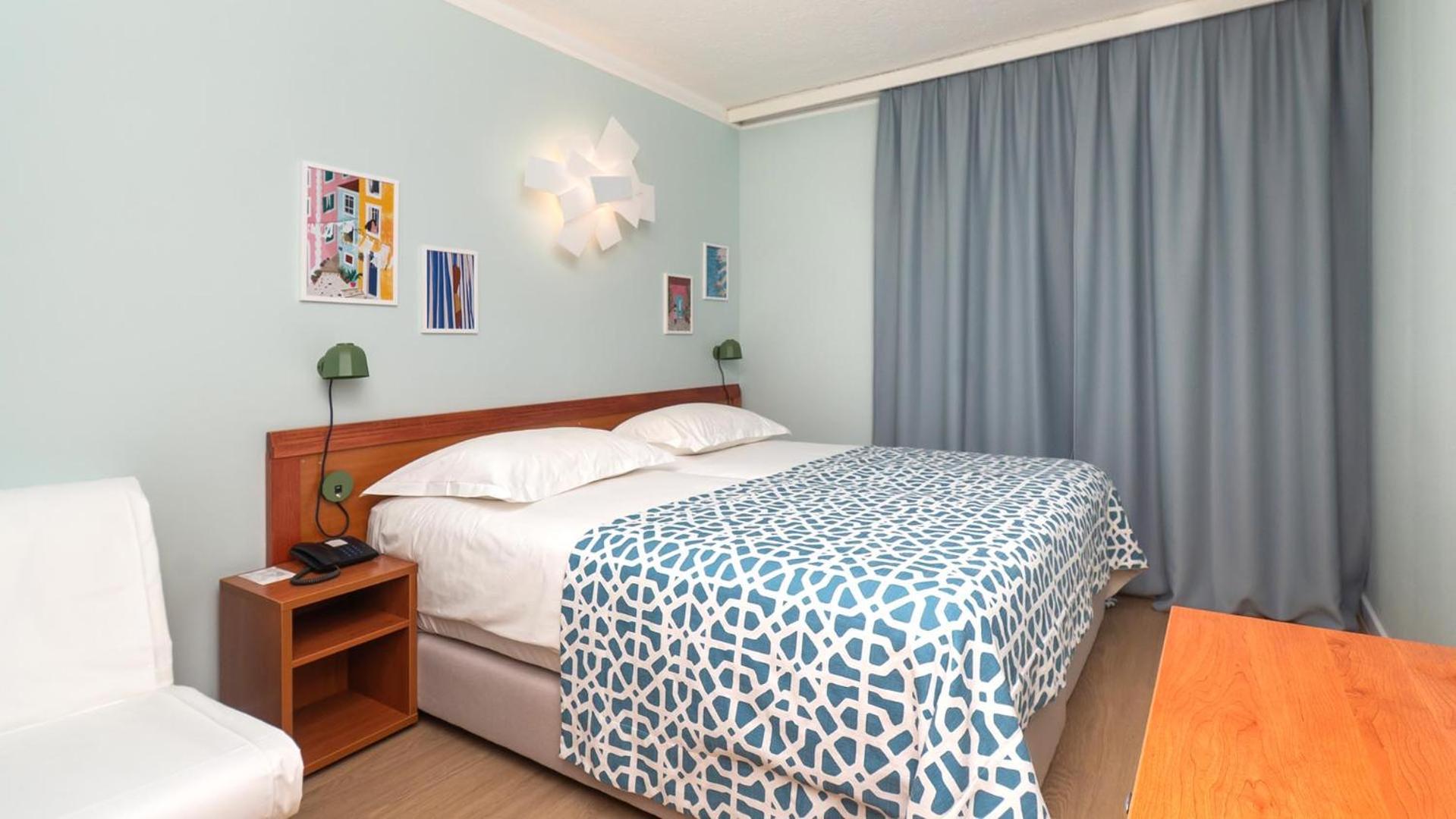 Twin Room with Balcony and Courtyard View (2 Adults + 1 Child ),1665397921:JPEG