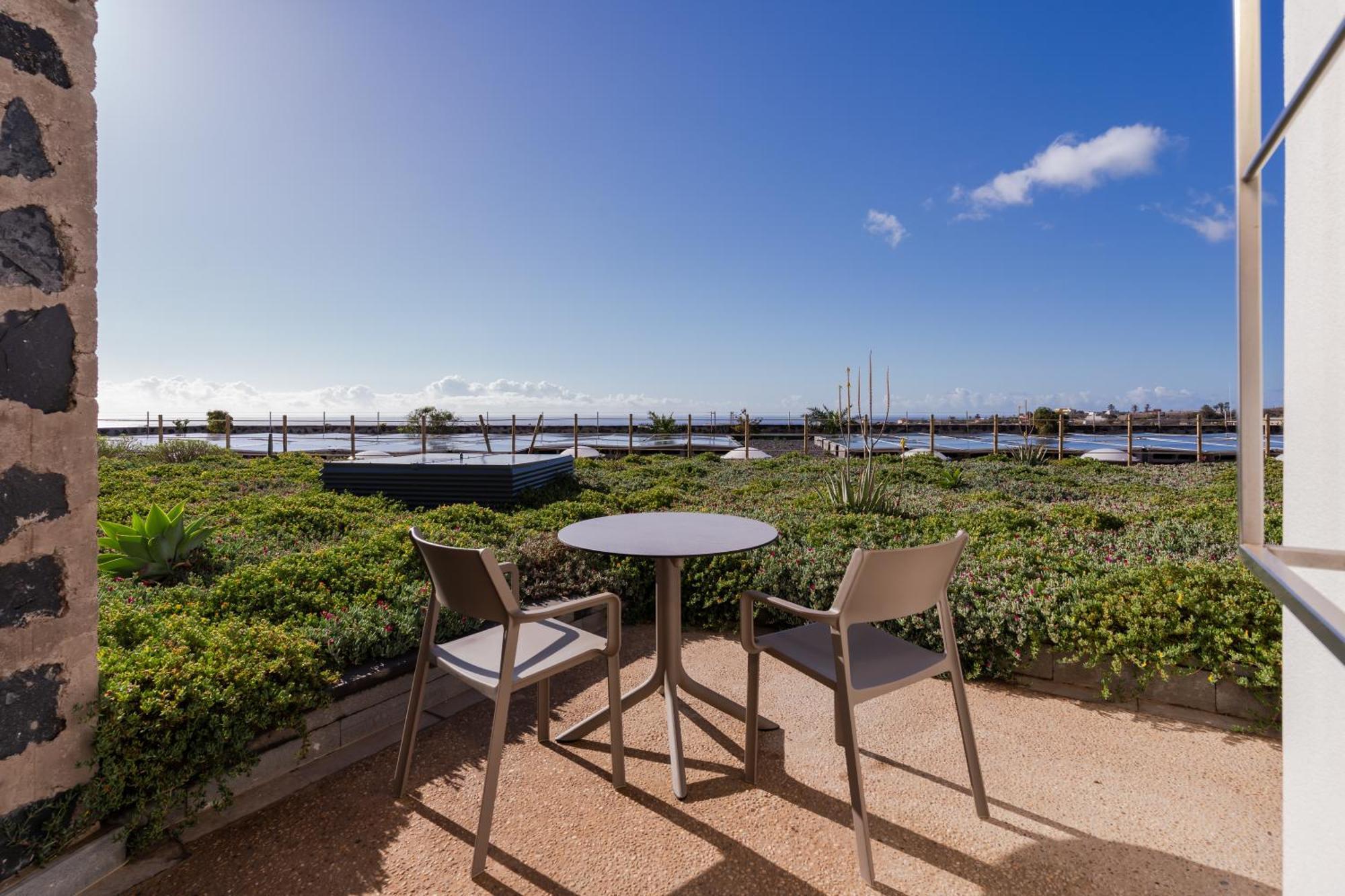 Dreibettzimmer mit Gartenblick