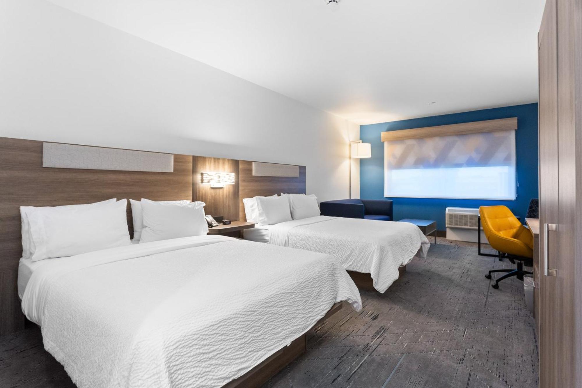 Queen Suite with Two Queen Beds and Sofa Bed