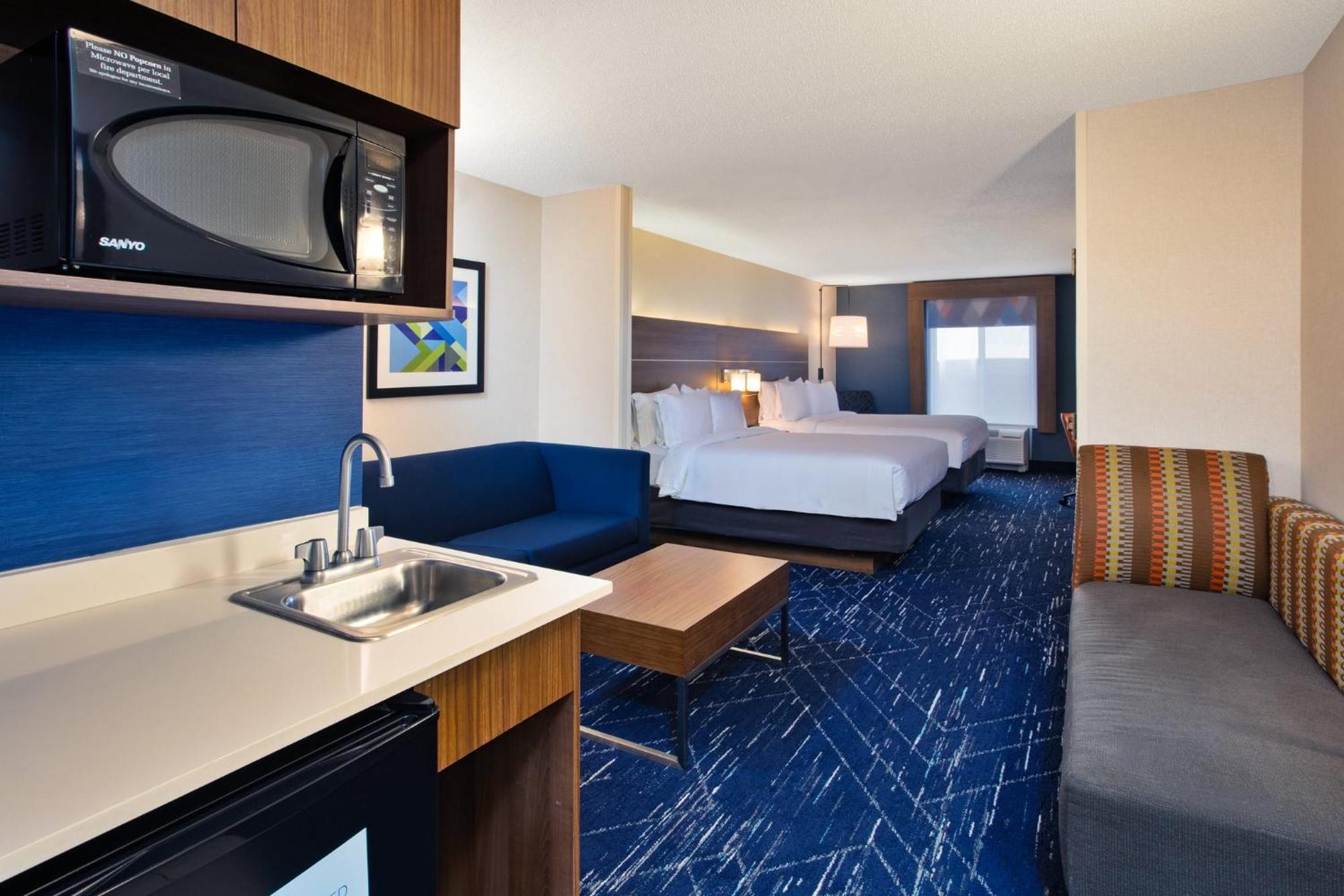 Queen Suite with Two Queen Beds and Sofa Bed