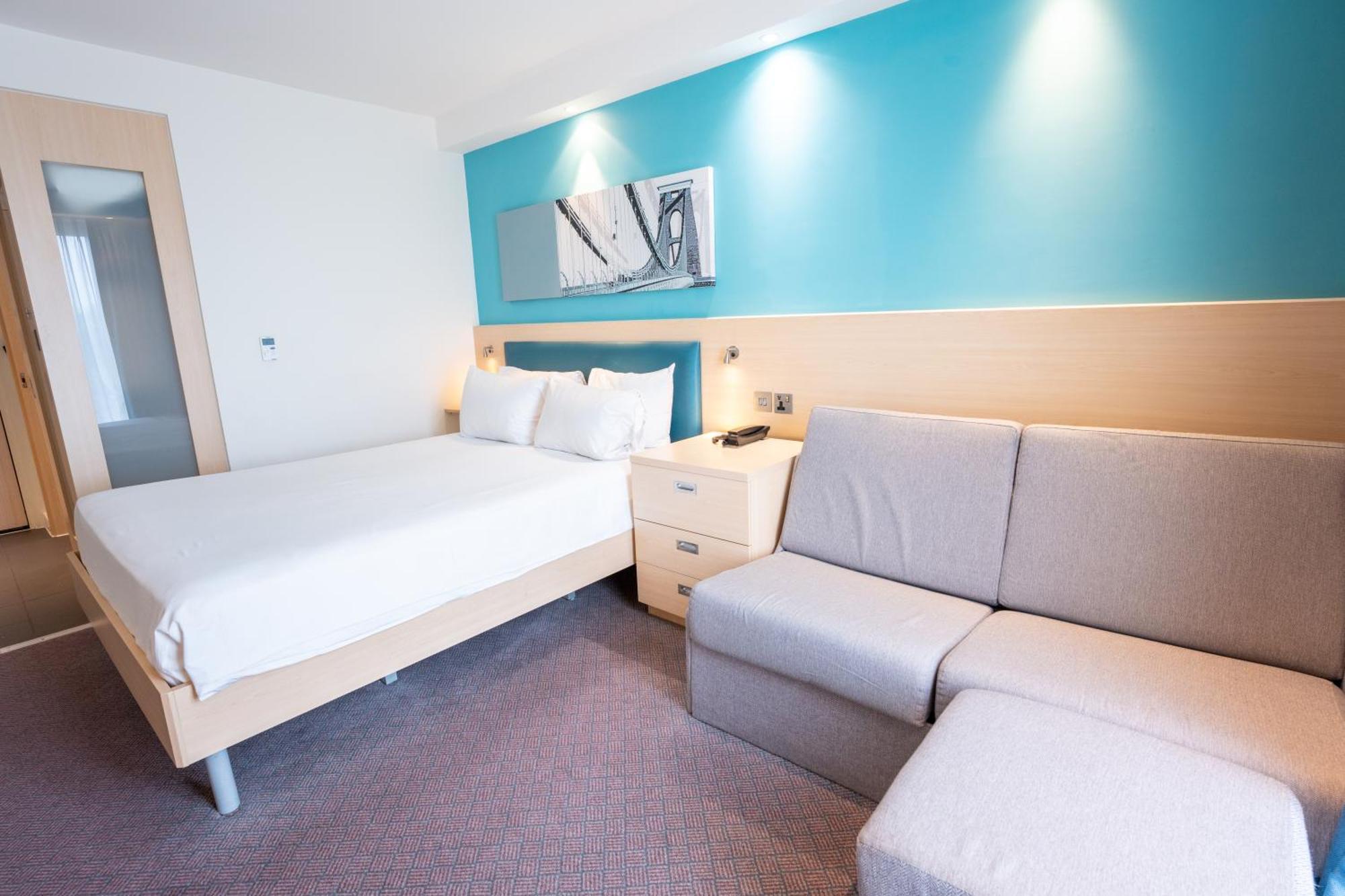 Queen Room with King Bed and Sofa Bed
