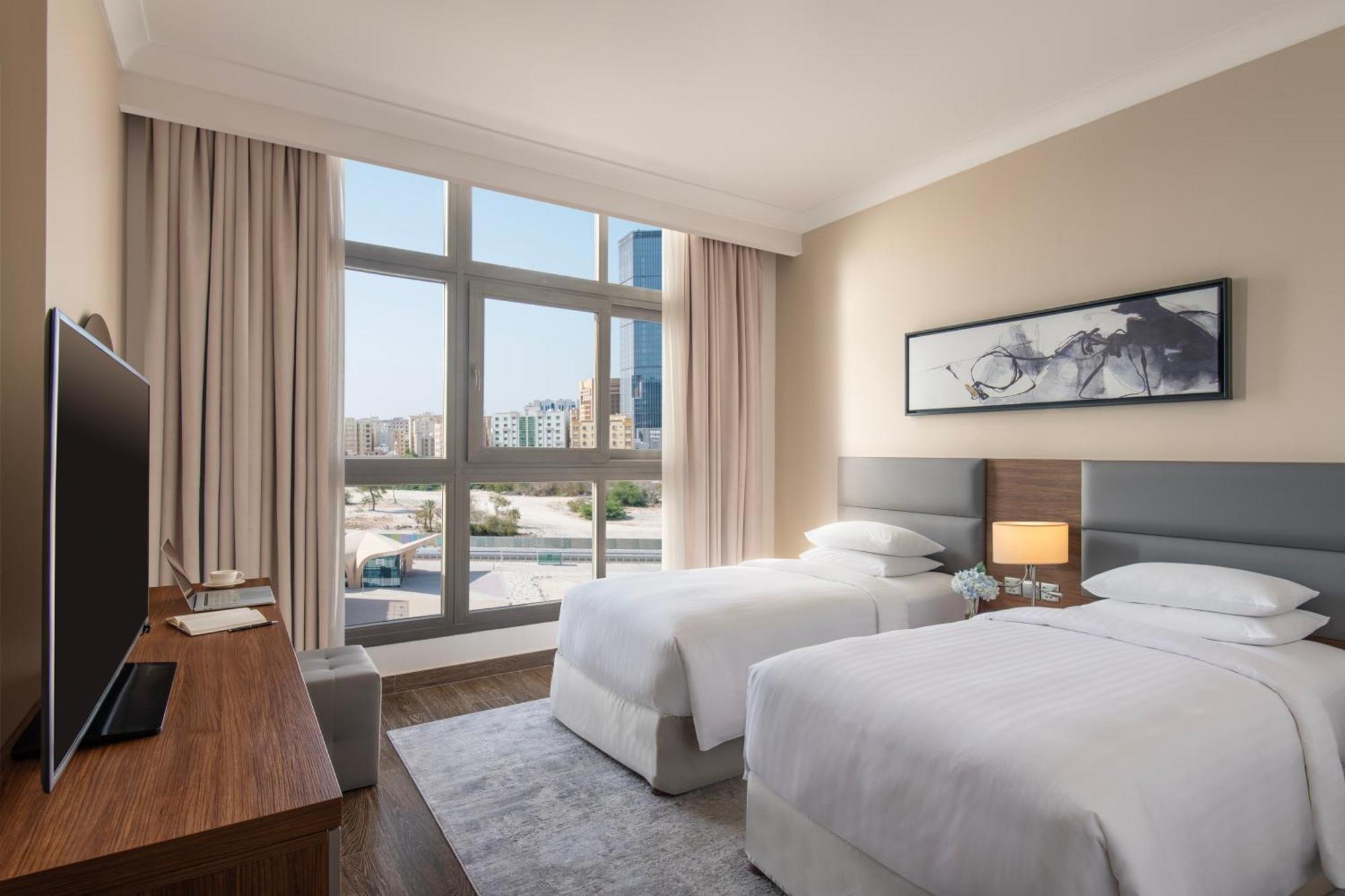 Two-Bedroom Duplex Apartment Balcony City View