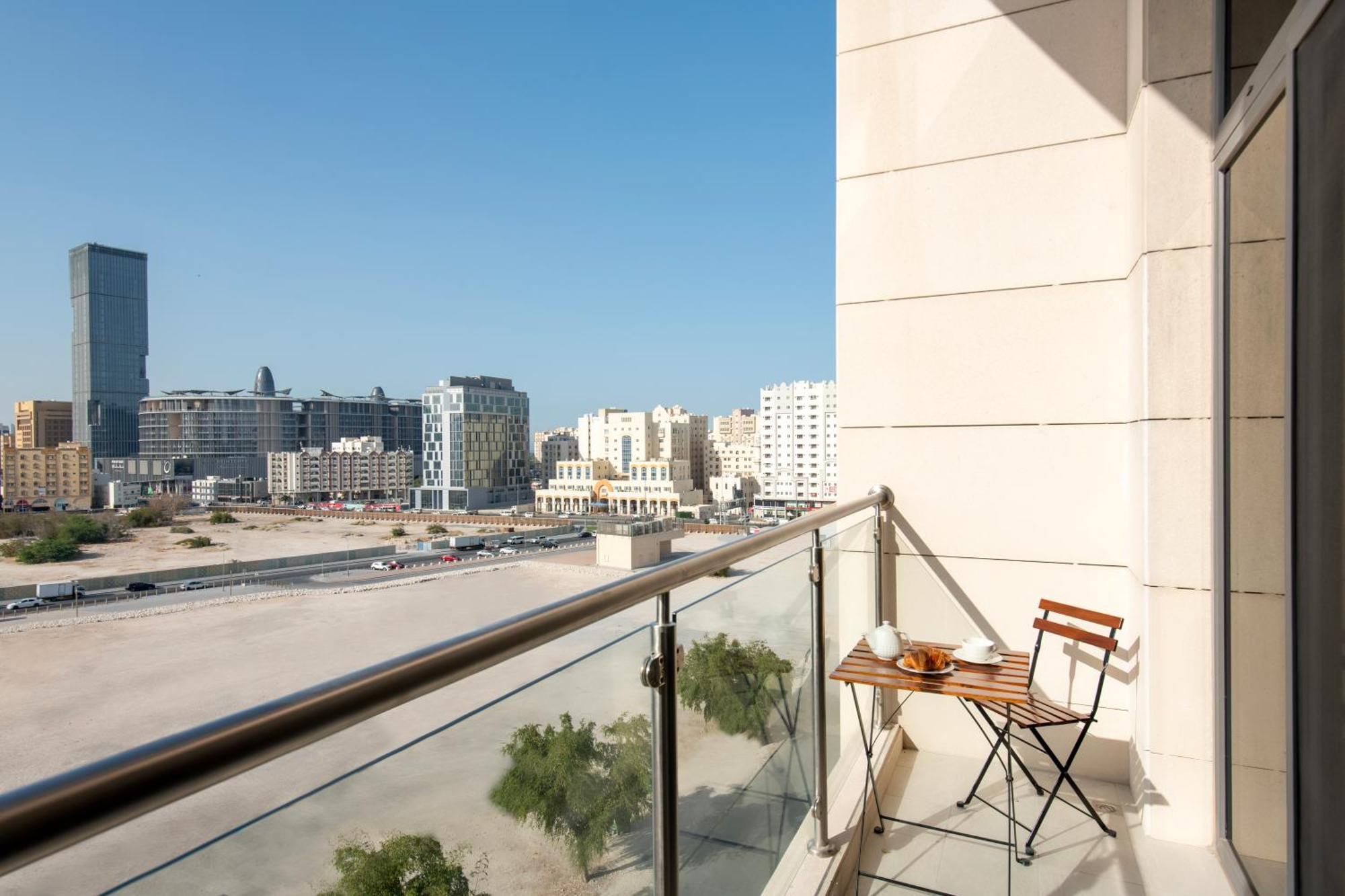 Two-Bedroom Duplex Apartment Balcony City View