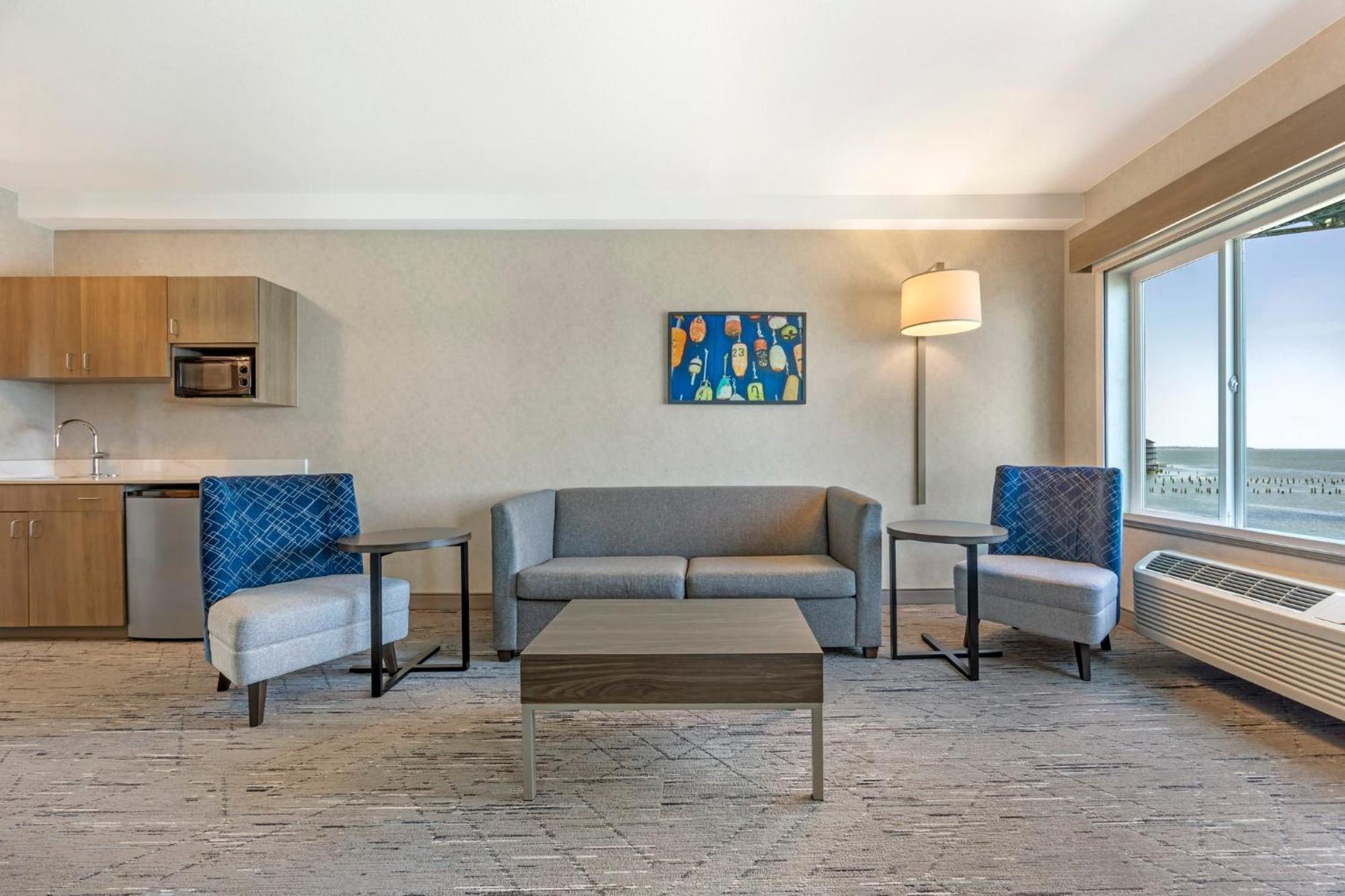 Suite with One King, Queen and Sofa Bed